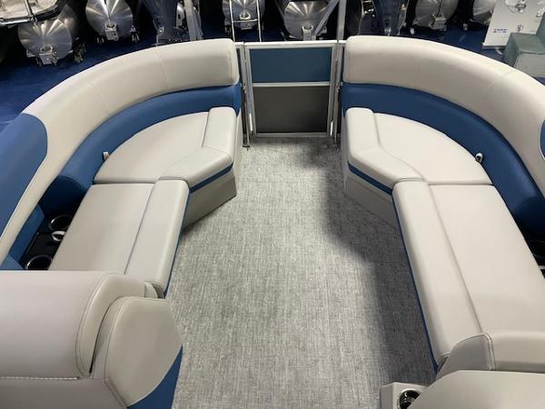 2025 South Bay LE pontoon boat interior with gray and blue seating.