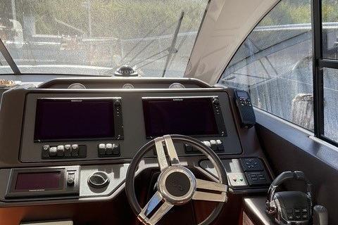 Cockpit of 2014 Beneteau Gran Turismo 49 yacht with dual navigation screens.
