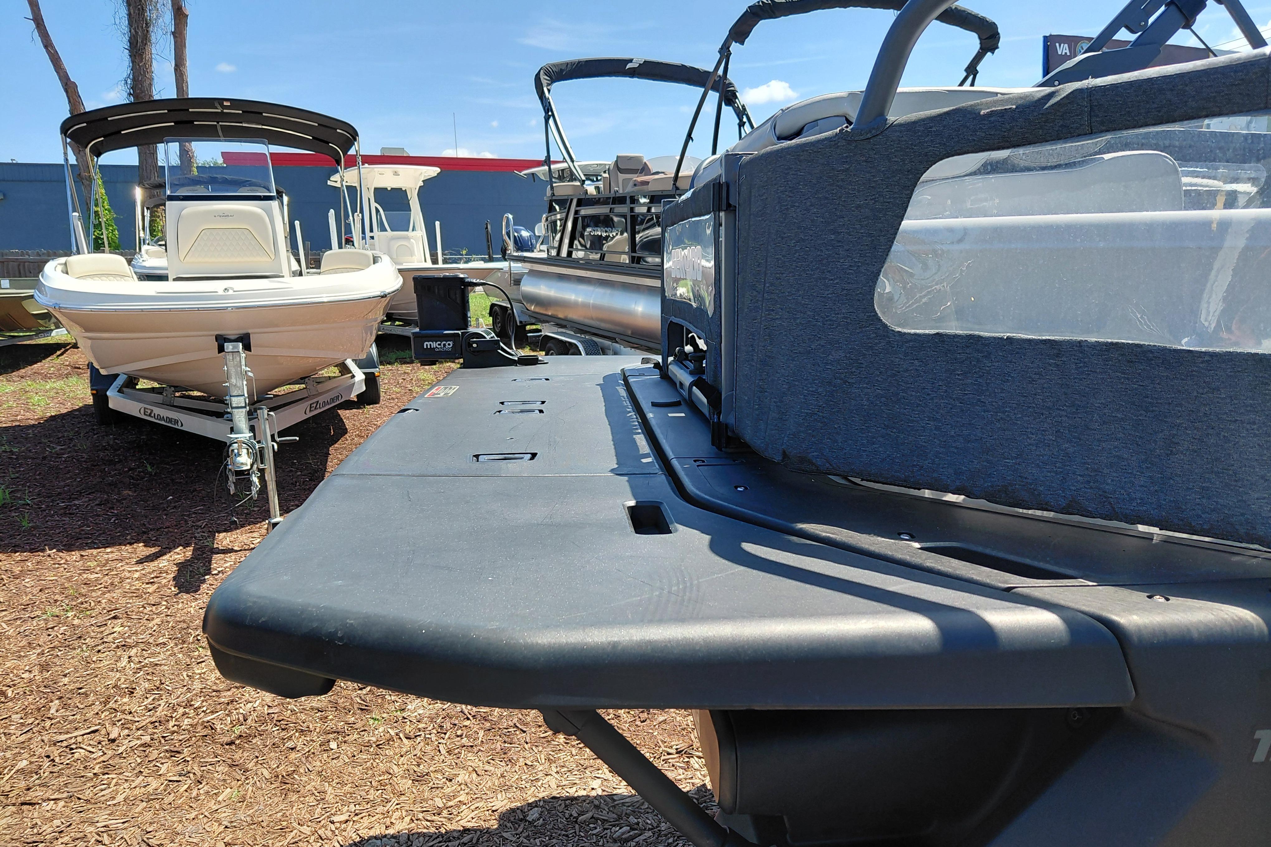 2024 Sea-Doo Switch Cruise 18 pontoon boat displayed outdoors, showcasing sleek design and modern features.