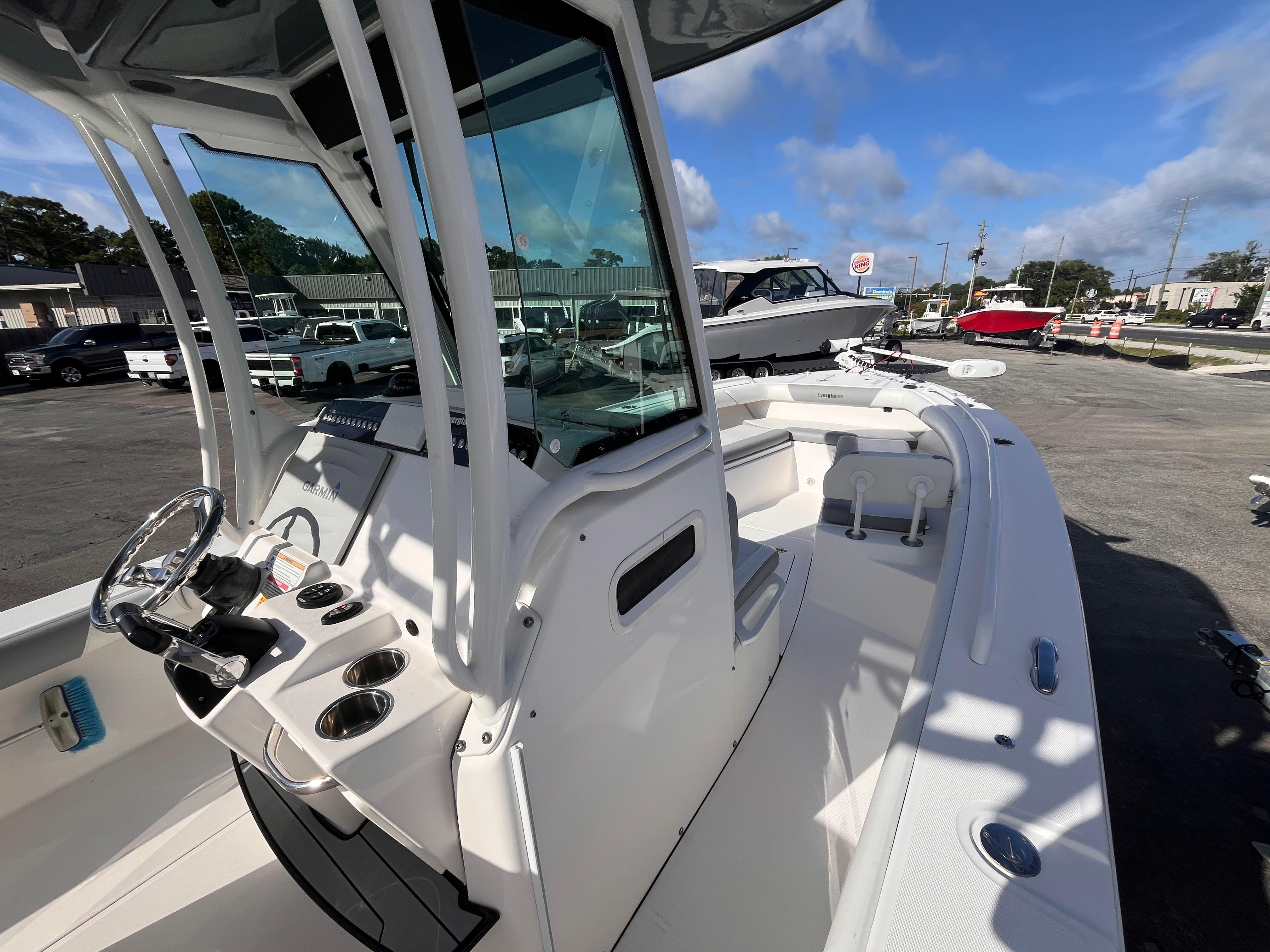 2017 Everglades 273 Center Console boat with sleek design and modern controls.