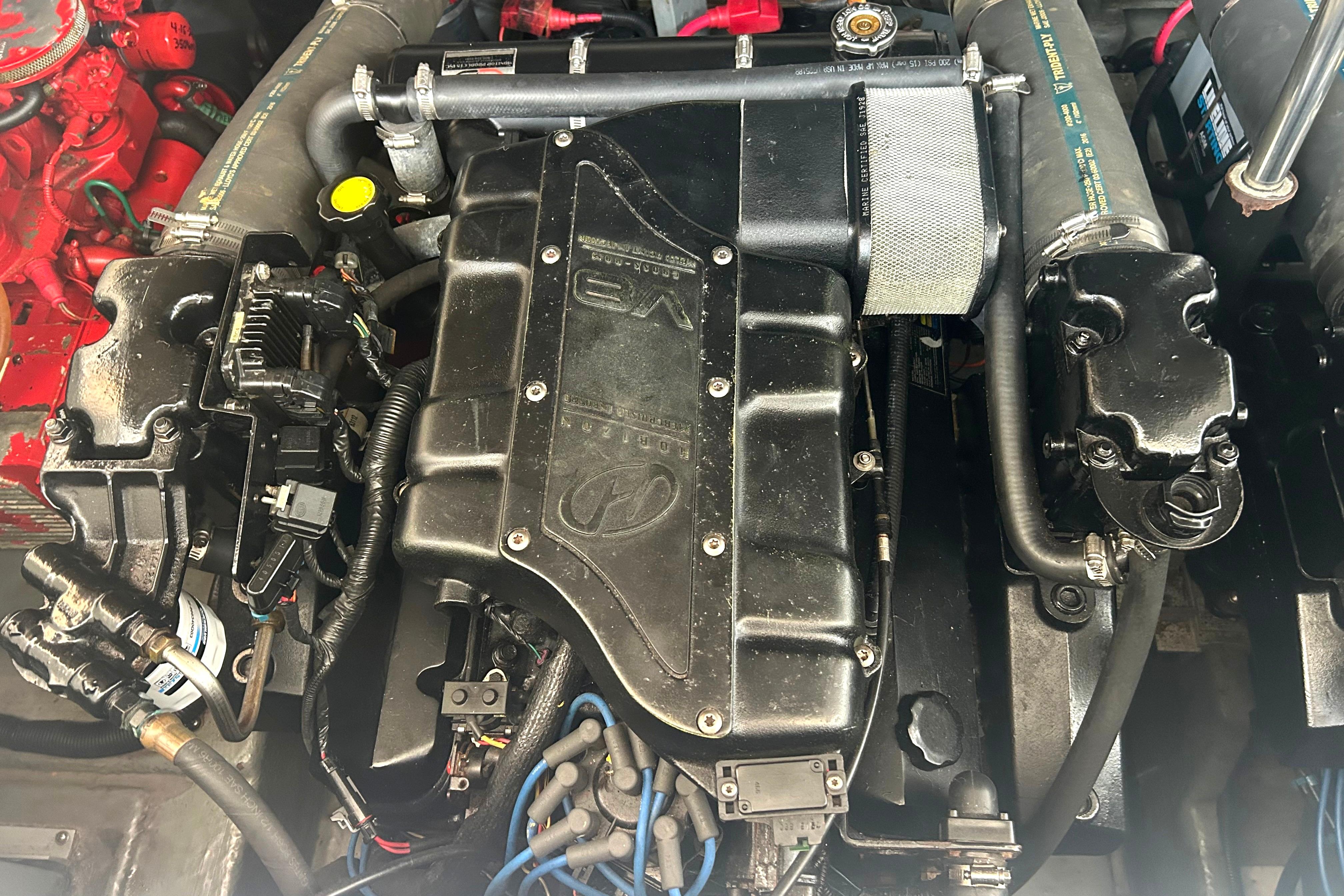 Engine compartment of a 2000 Sea Ray 340 Sundancer boat.