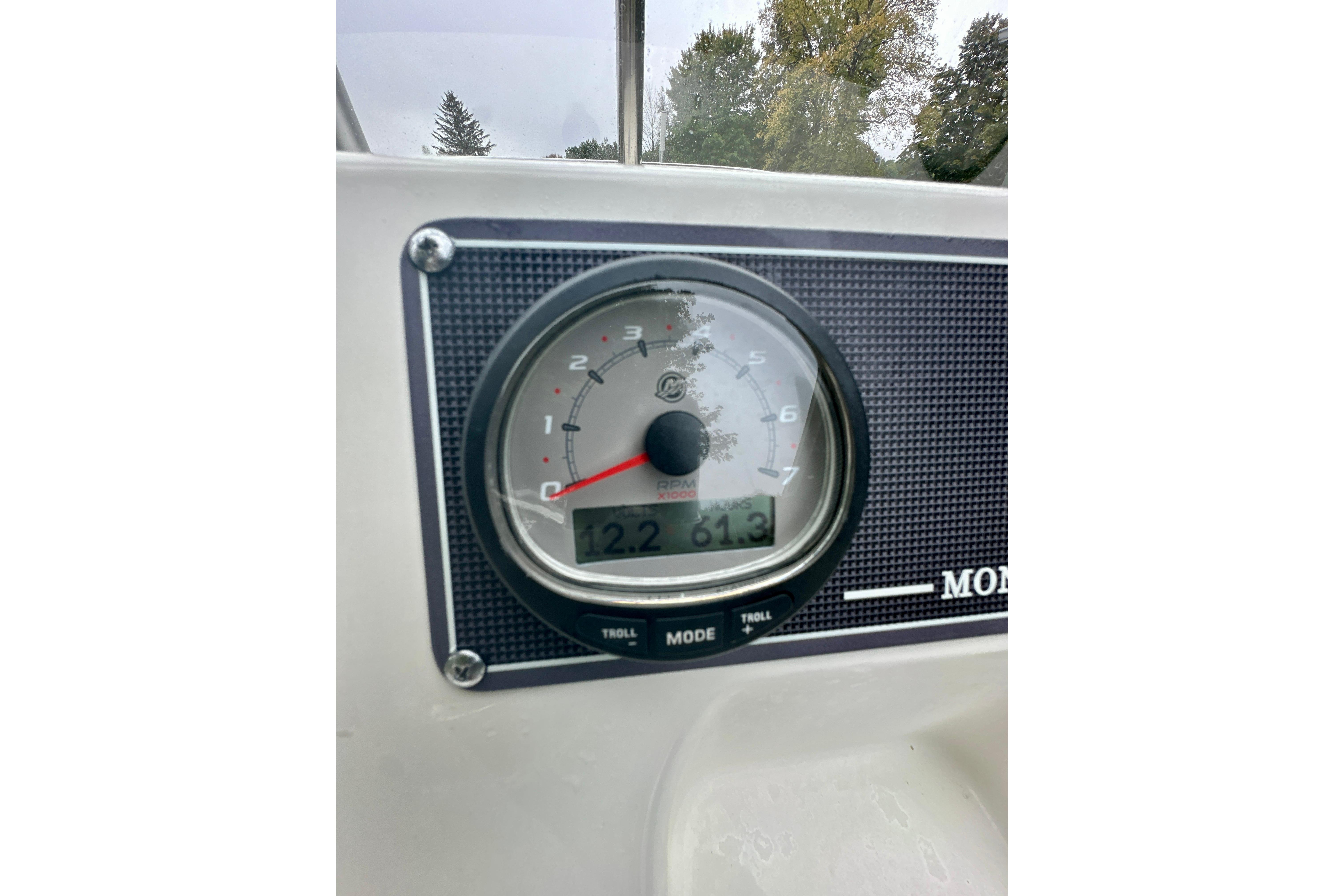 Dashboard of 2024 Boston Whaler 170 Montauk boat showing speedometer and digital display.