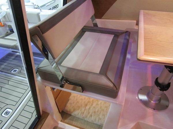 2025 Cutwater C-248 Coupe interior seating and table detail.