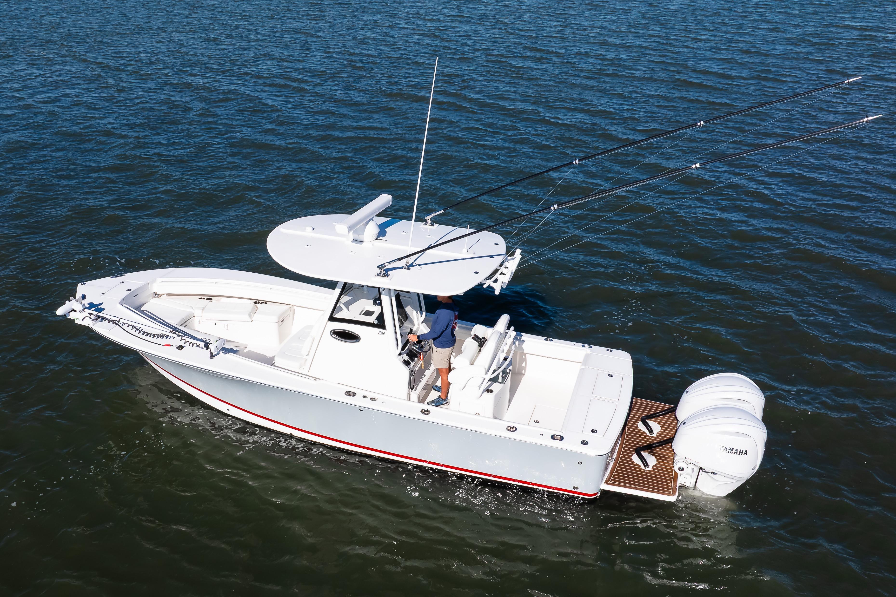 2022 Regulator 28 Forward Seating boat on open water, featuring dual Yamaha engines.