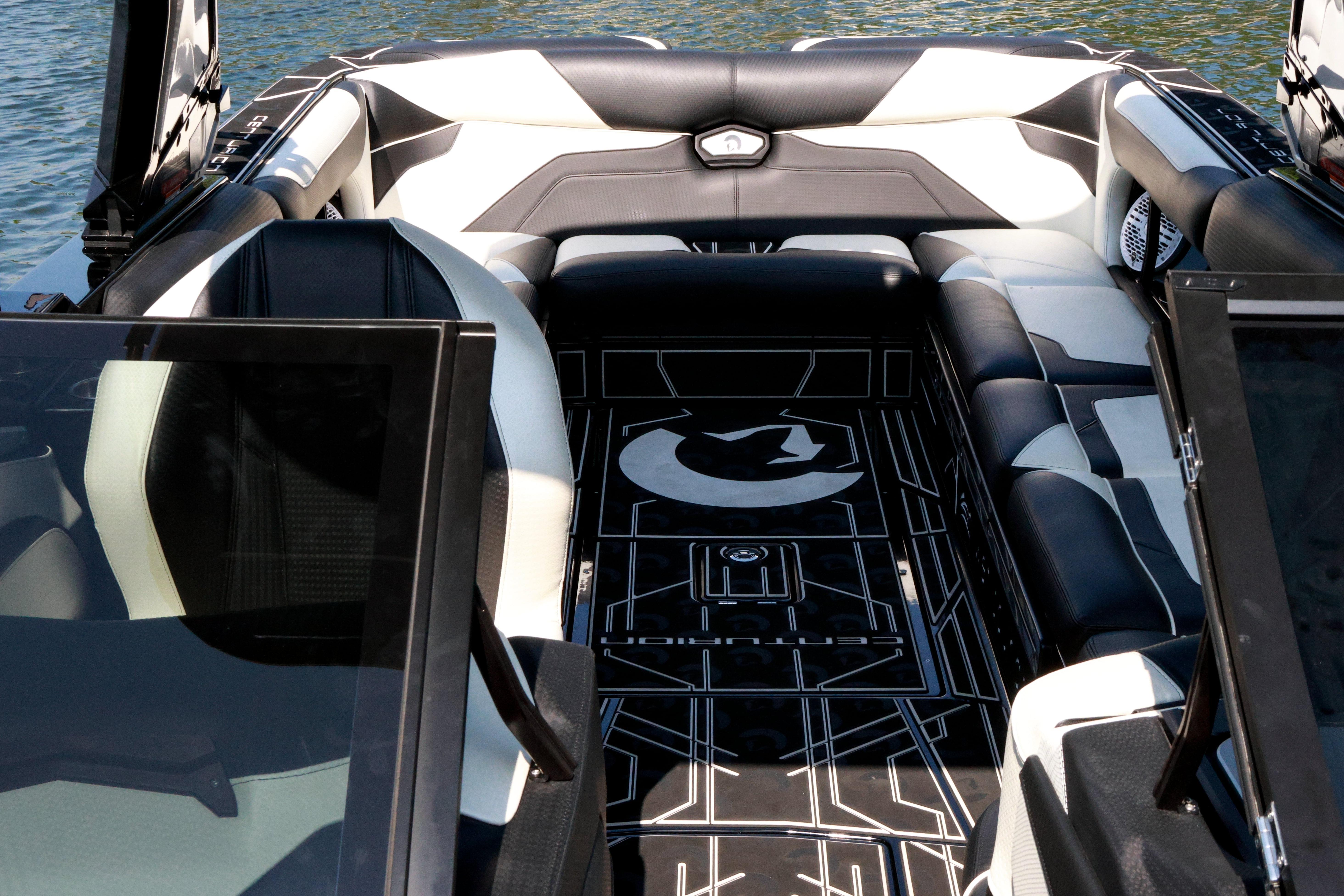 2022 Centurion Ri265 boat interior with sleek black and white seating and modern design.