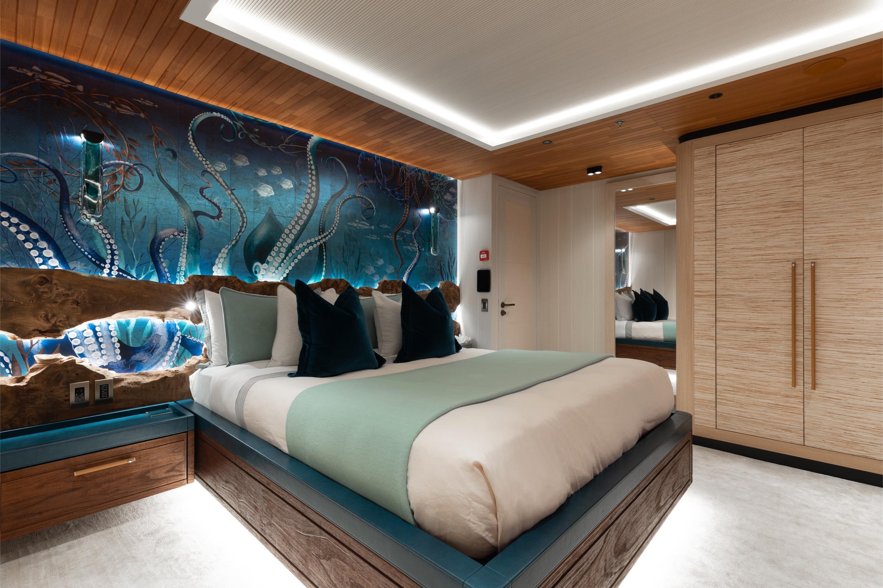 Luxurious 2024 Dunya Yachts Explorer bedroom with ocean-themed decor and modern design.
