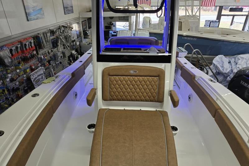 Interior view of 2026 Sea Hunt Ultra 275 Coffin Box boat with tan seating.