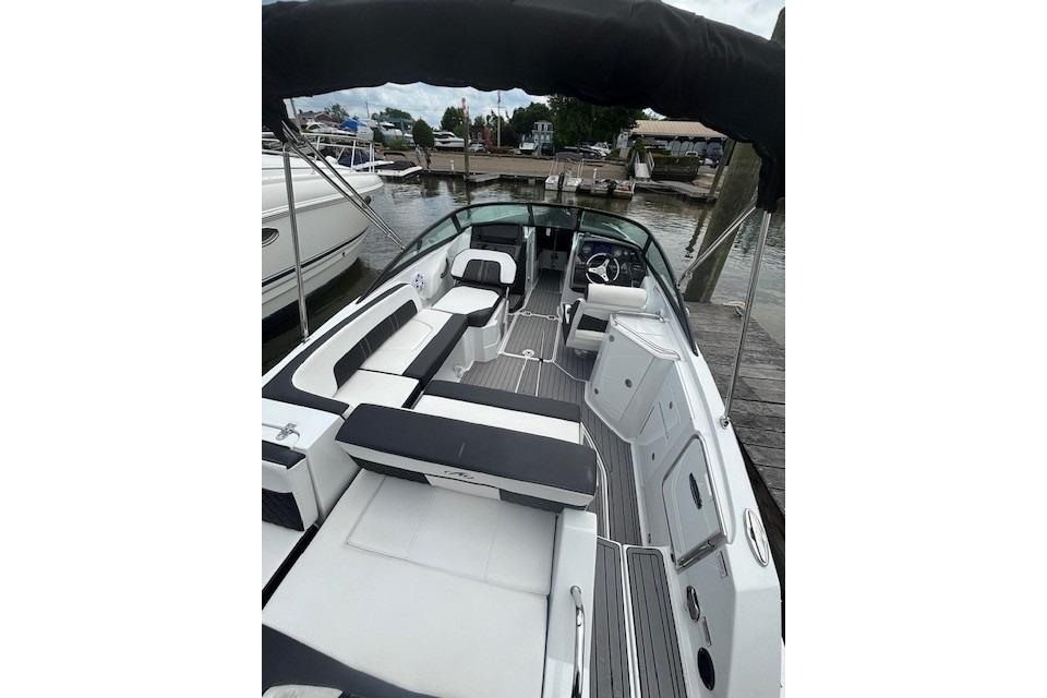 2023 Monterey M-45 boat interior with sleek seating and modern design at a dock.