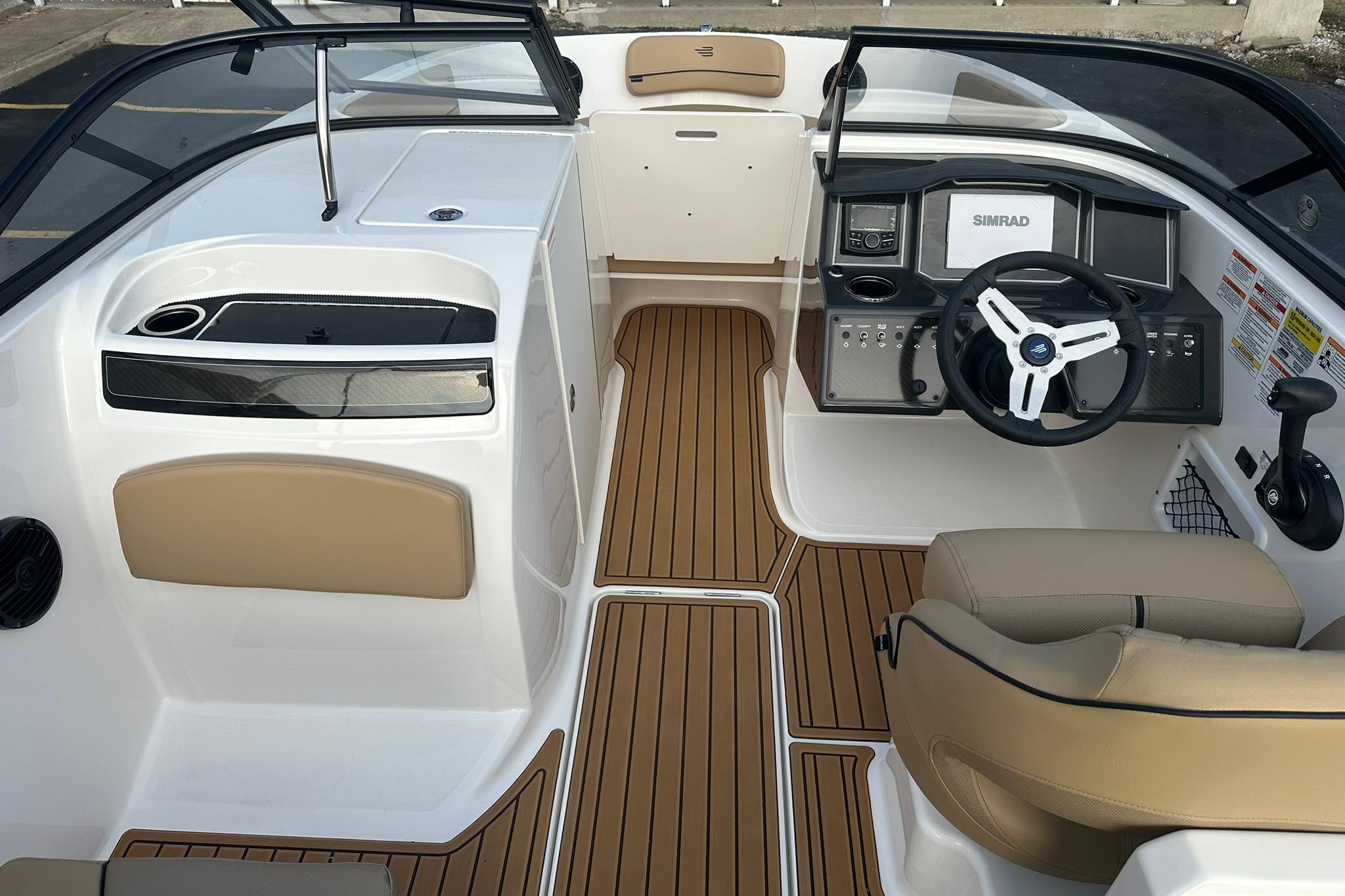 2026 Bayliner VR6 Bowrider OB interior with modern dashboard and seating.