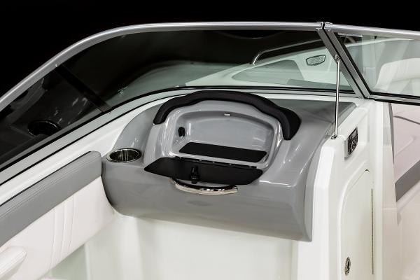 Manufacturer Provided Image: 2022 Chaparral 23 SSi boat dashboard with glove compartment and cup holder.