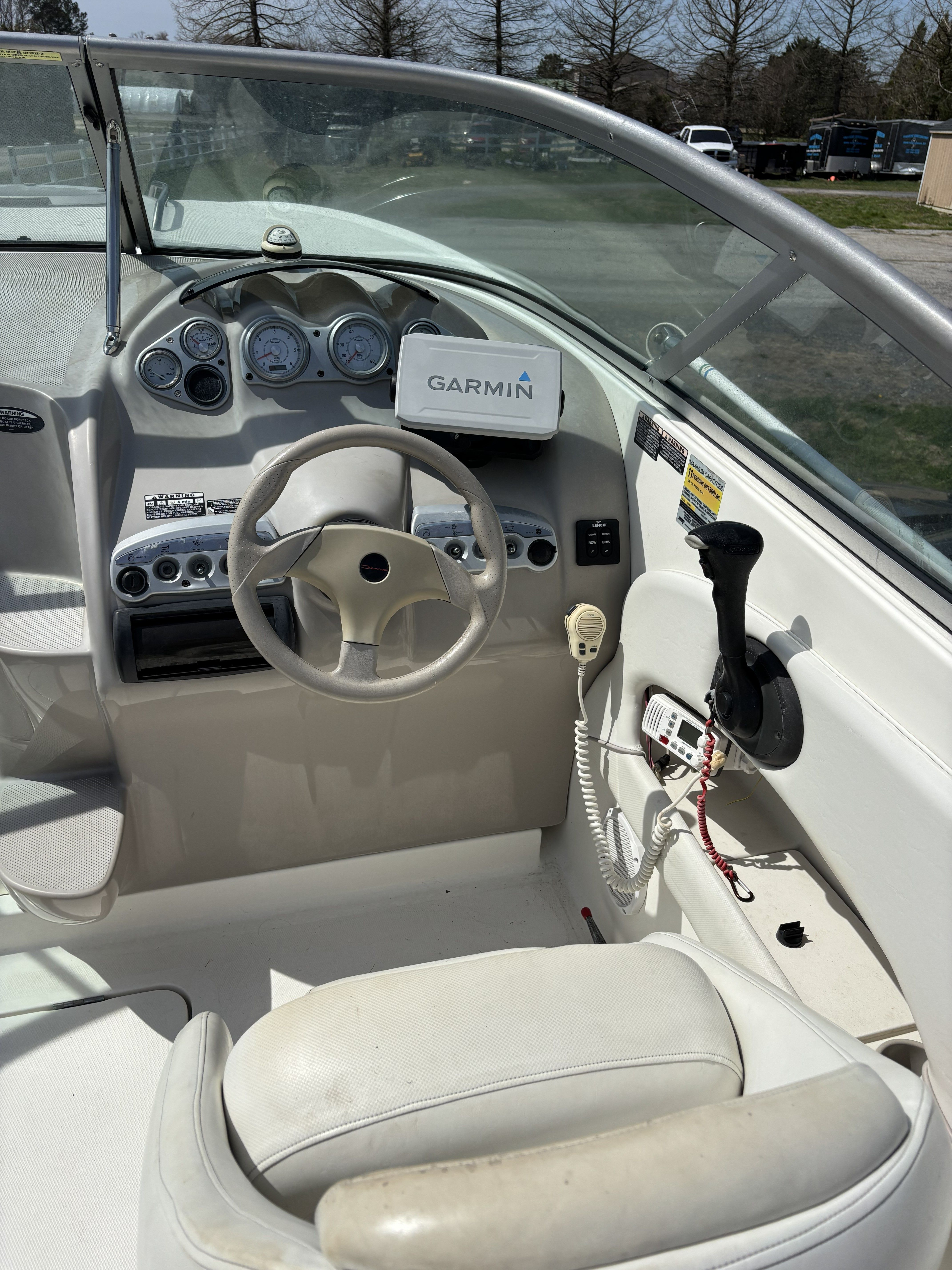 Interior of a 2005 Maxum 2400 SC3 boat with Garmin navigation.