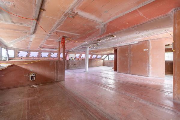 Spacious interior of 2025 Catamaran Bloomfield 86 Motorsailor under construction.