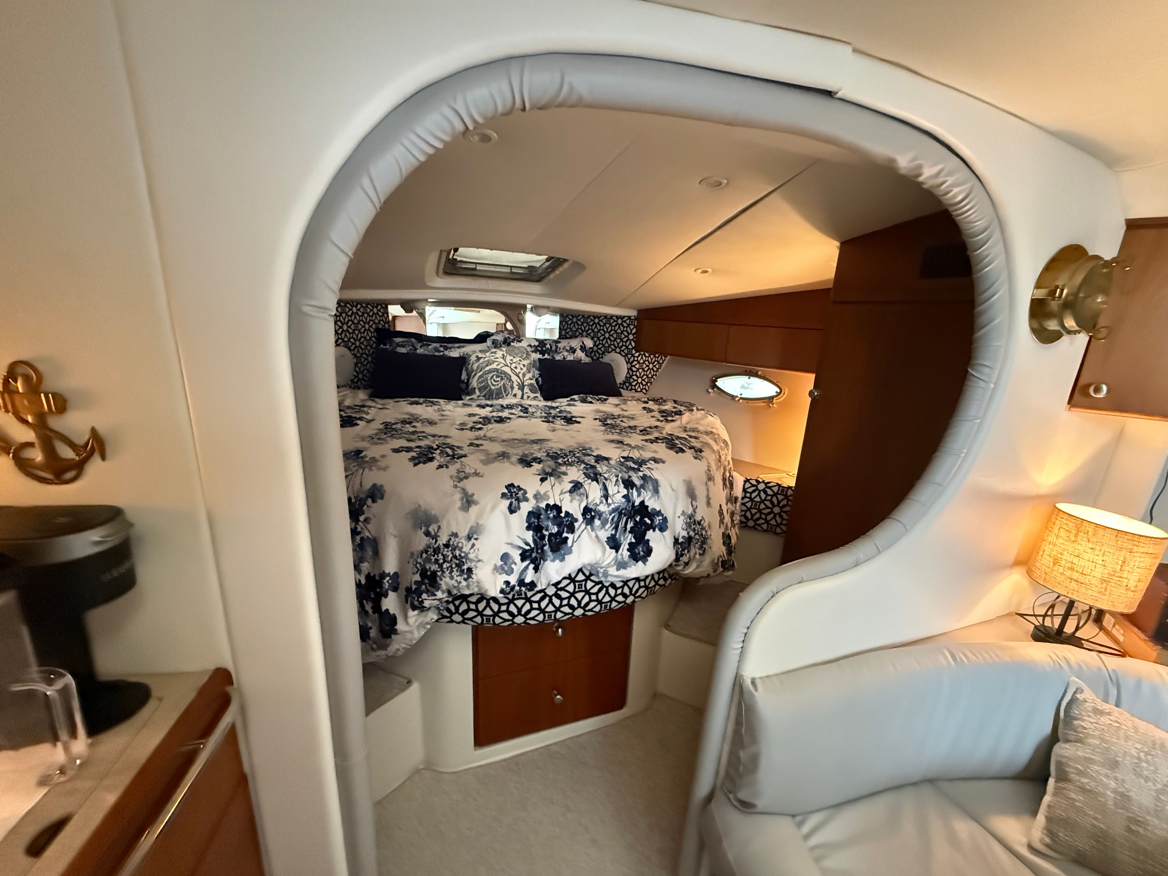 Interior of a 1995 Silverton 360 with a cozy bed and elegant decor.