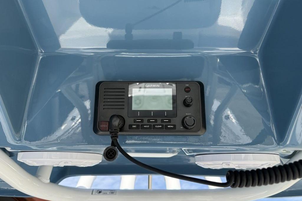 Garmin marine radio on 2026 Tidewater 232 LXF boat dashboard.