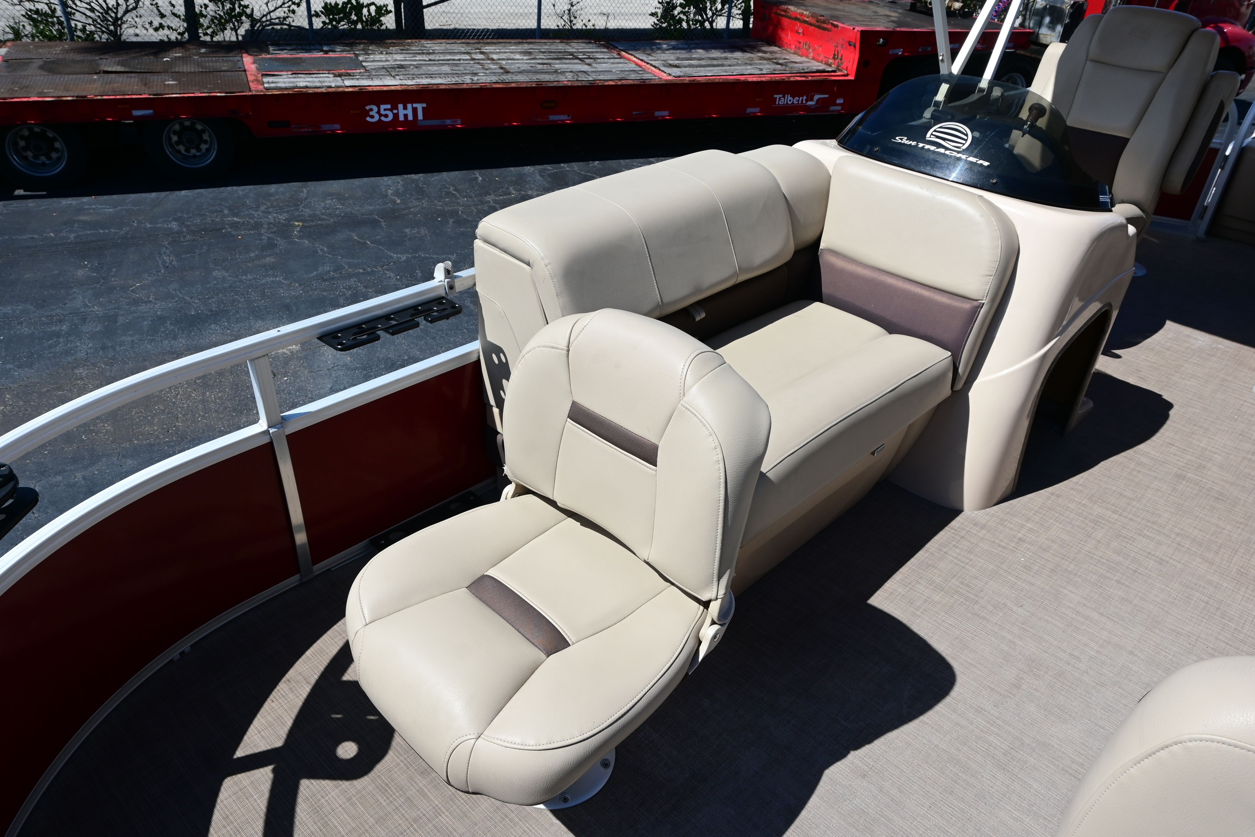 Interior of a 2019 Sun Tracker FISHI boat with beige seating.