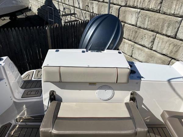 2025 Cutwater C-248 C (COUPE) boat interior with seating and outboard motor.
