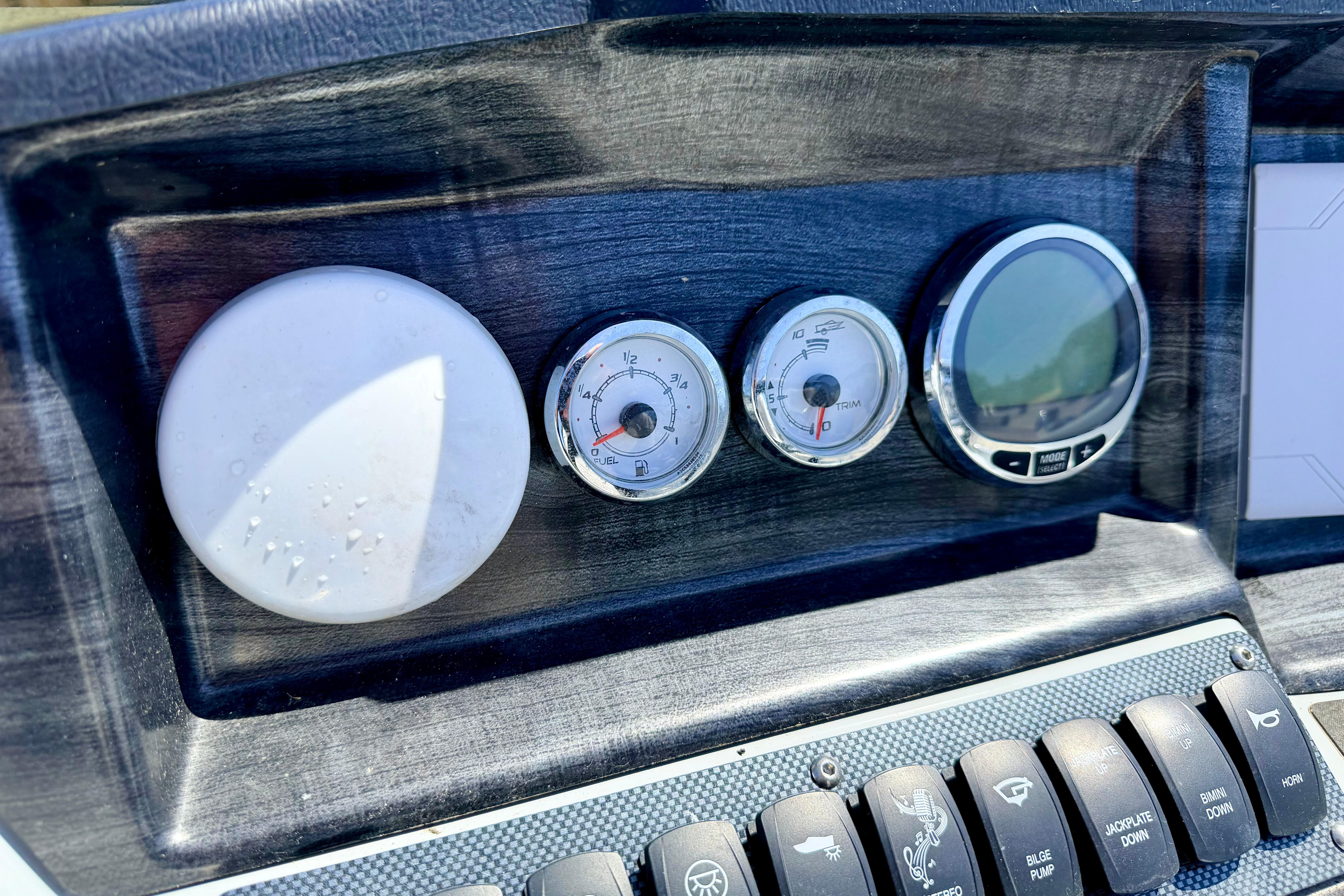 Dashboard of 2019 Crestliner 240 Rally DX CW with gauges and controls.