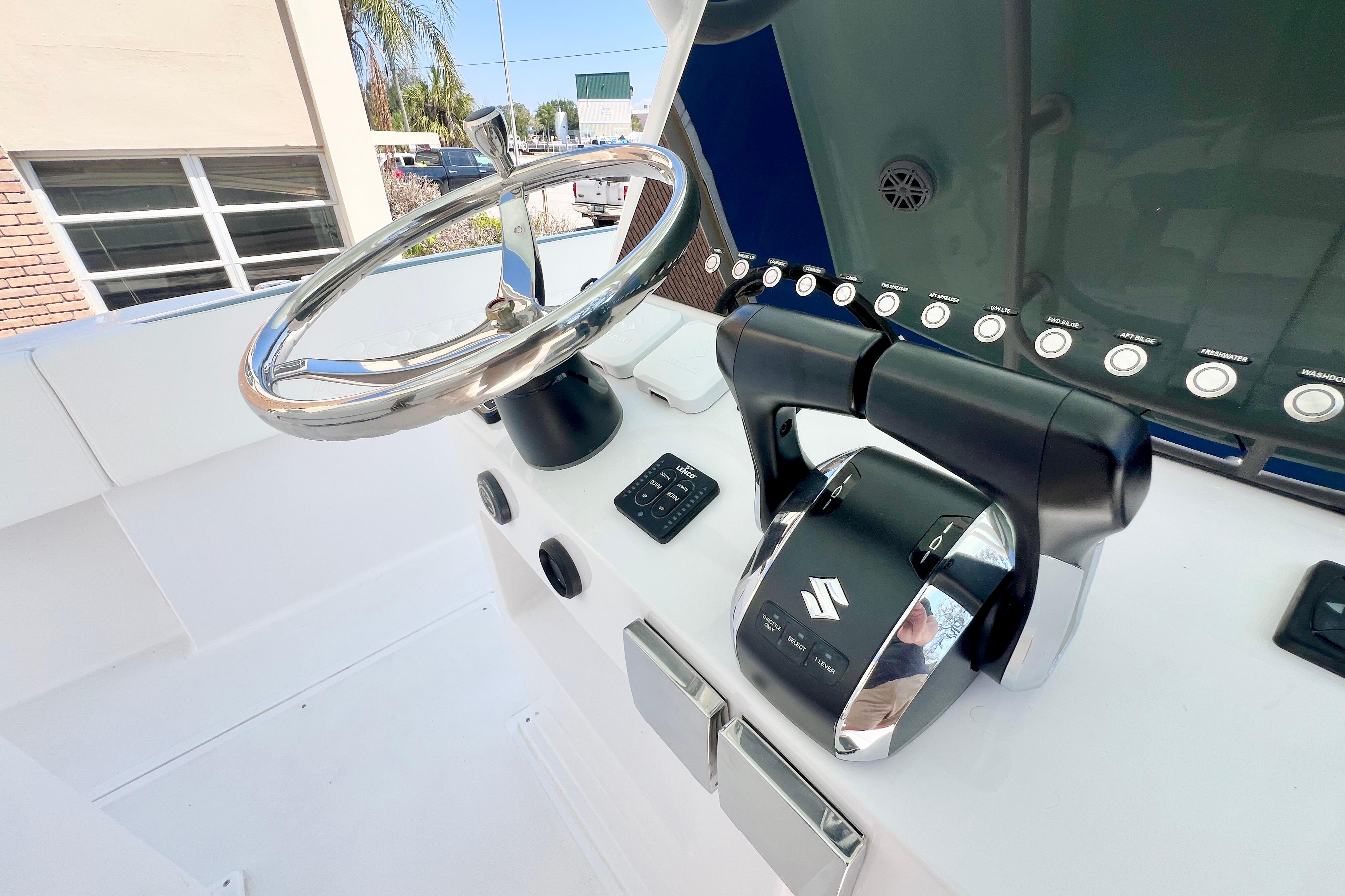 Steering wheel and controls of 2026 Stamas 31T Aventura boat cockpit.