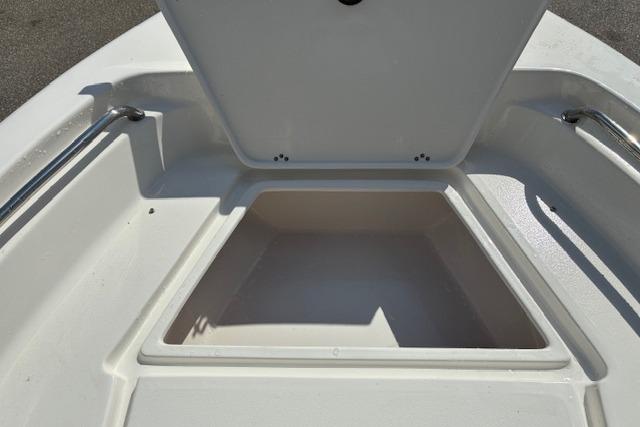 Open storage compartment on 2026 Key West 189 FS boat deck.