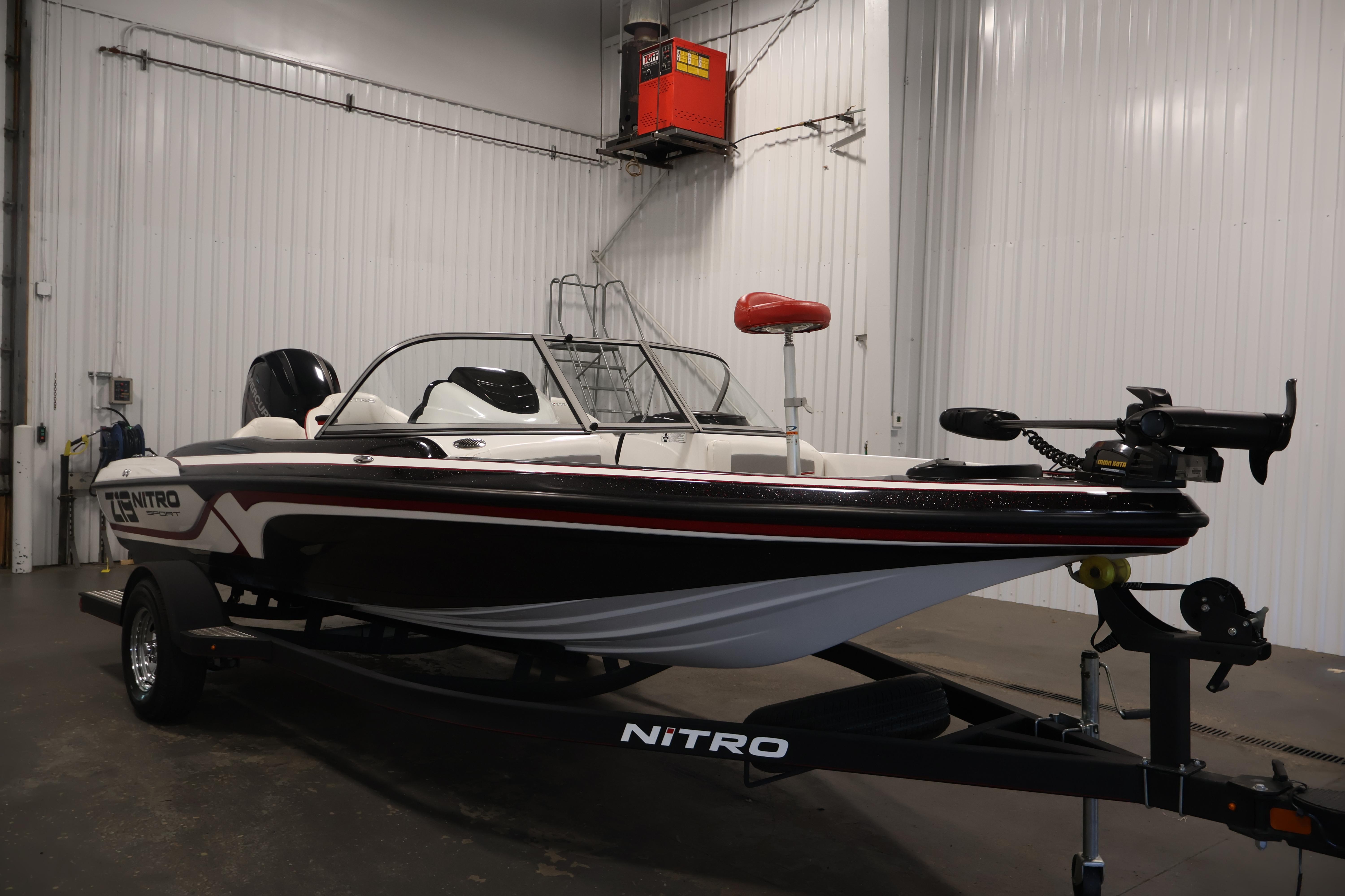 2019 Nitro Z19 Sport boat in a garage, showcasing sleek design and modern features.