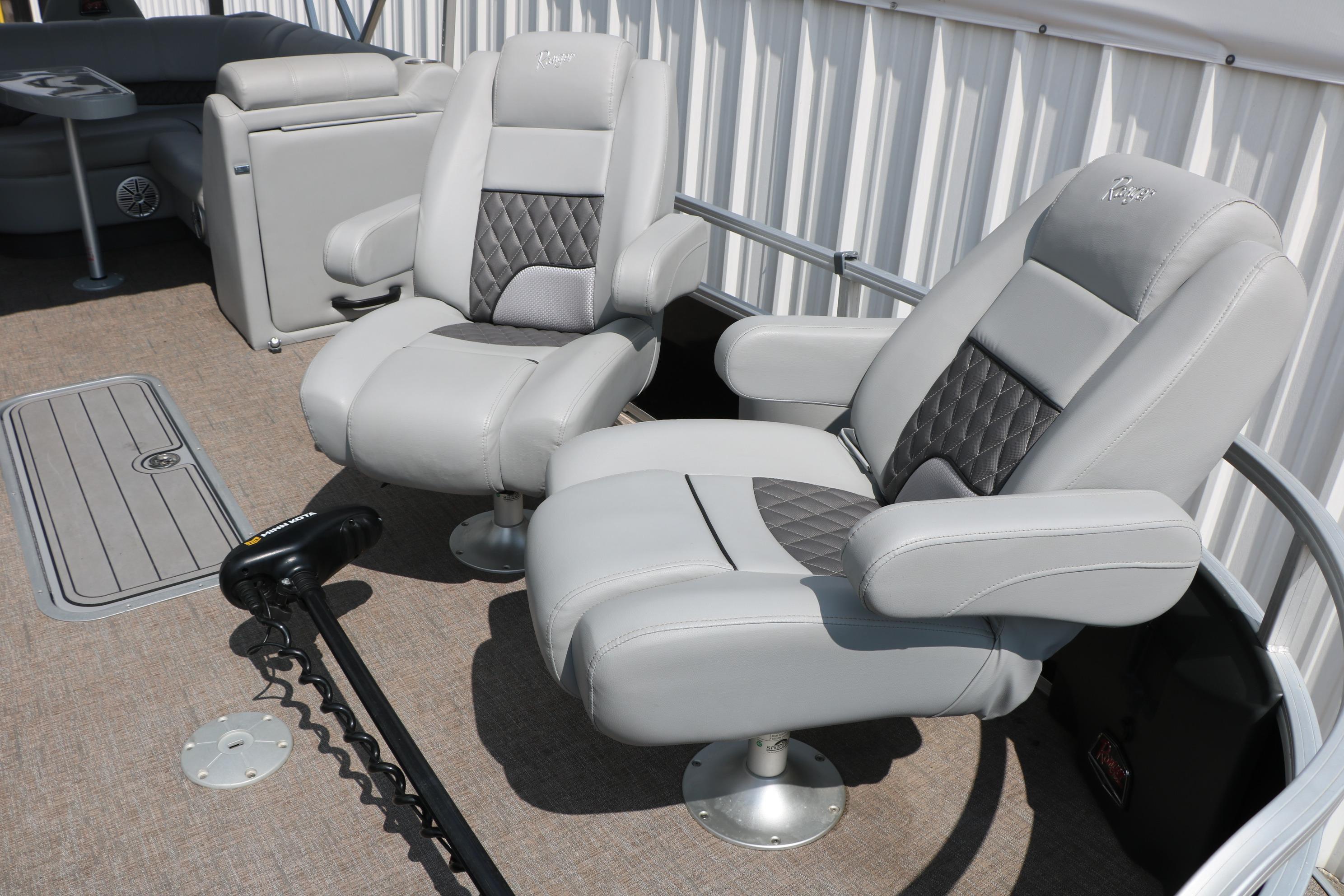 Luxury seating on 2021 Ranger 223FC boat with plush, diamond-stitched upholstery.