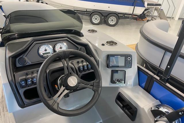 2026 Bentley Pontoons Legacy 223 Swingback dashboard with steering wheel and control panel.