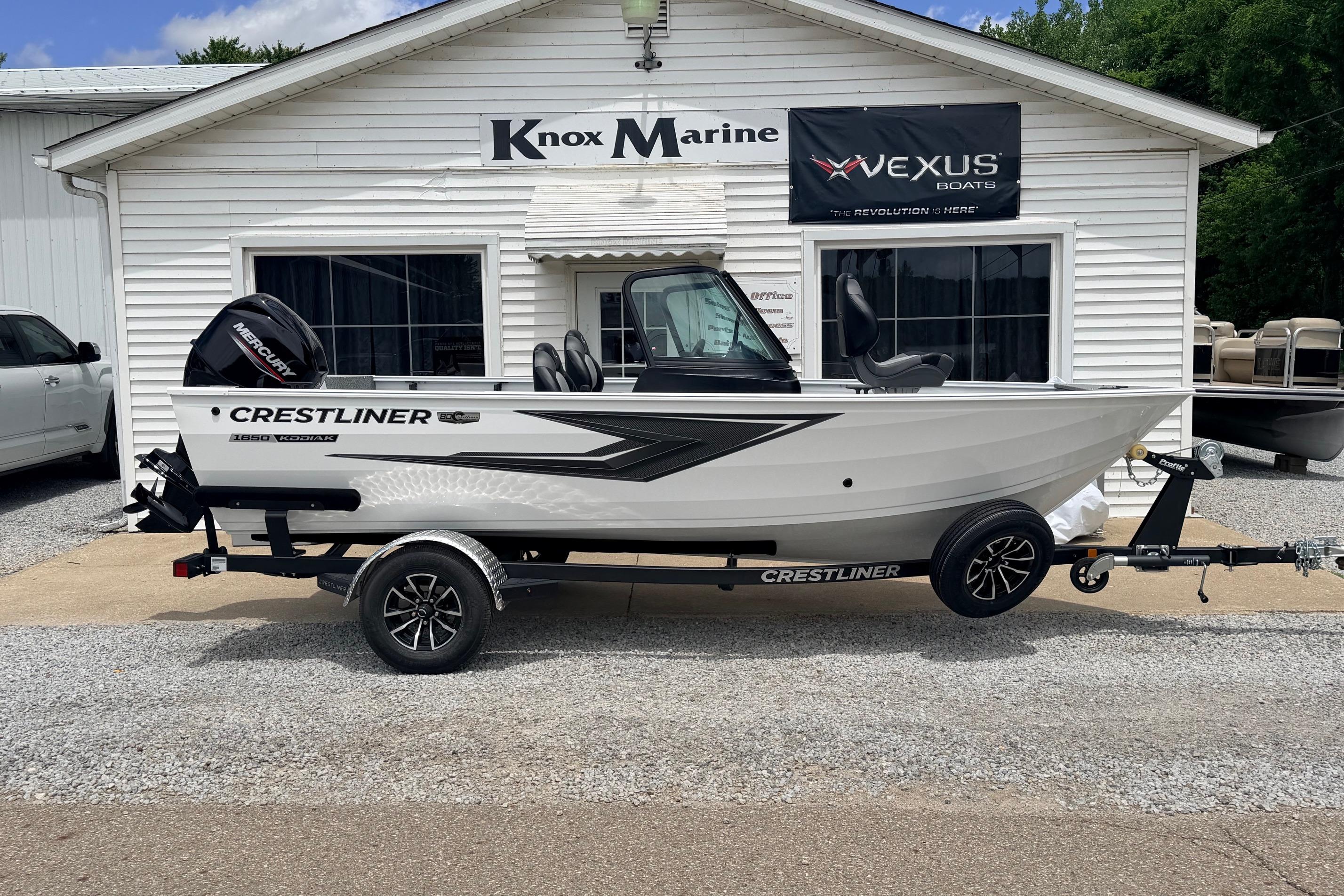 2026 Crestliner 1650 Kodiak WT boat on trailer outside Knox Marine dealership.
