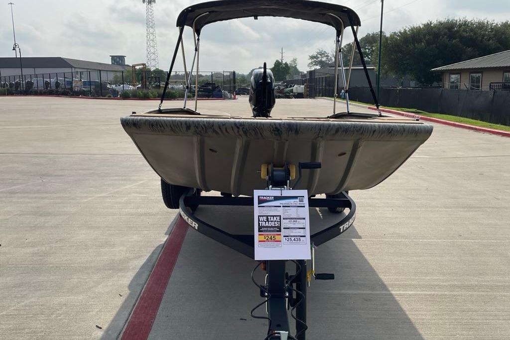2026 Tracker Grizzly 1756 T Marsh boat on trailer in parking lot.