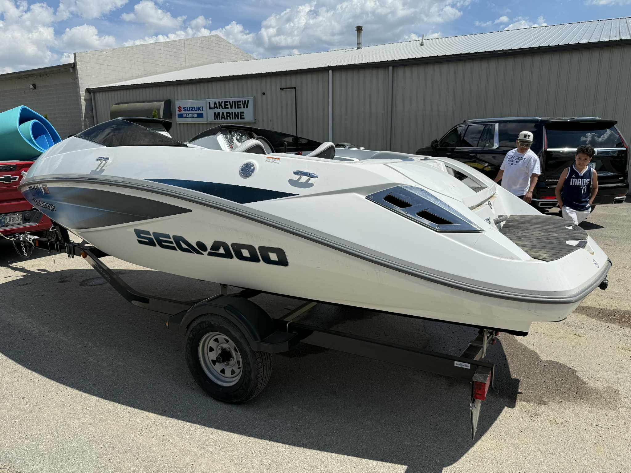 2006 Sea-Doo 180 Challenger boat on trailer at Lakeview Marine dealership.