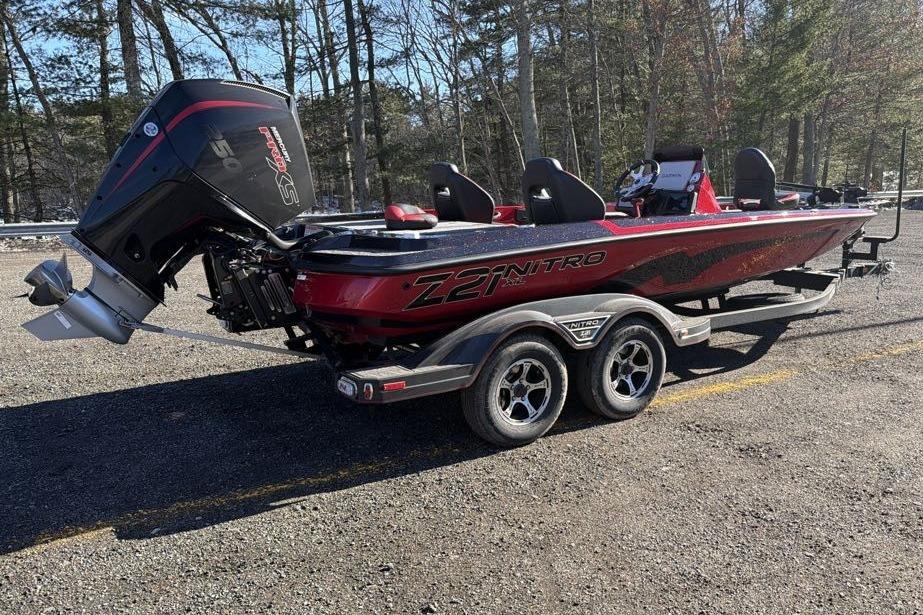 2026 Nitro Z21 XL Pro boat on trailer, parked outdoors.