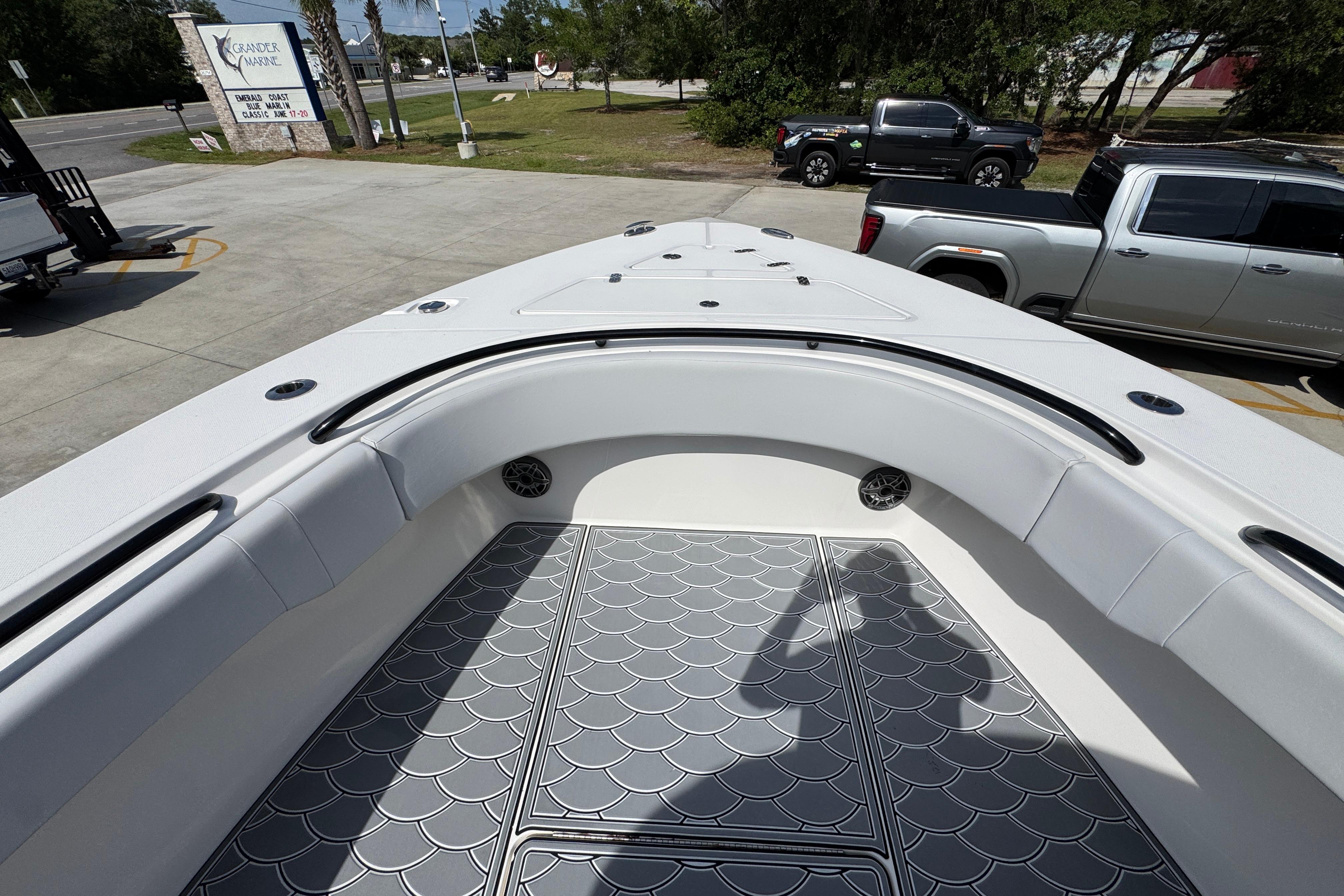 2023 Fountain 34 Tournament Edition boat interior with patterned flooring and seating.