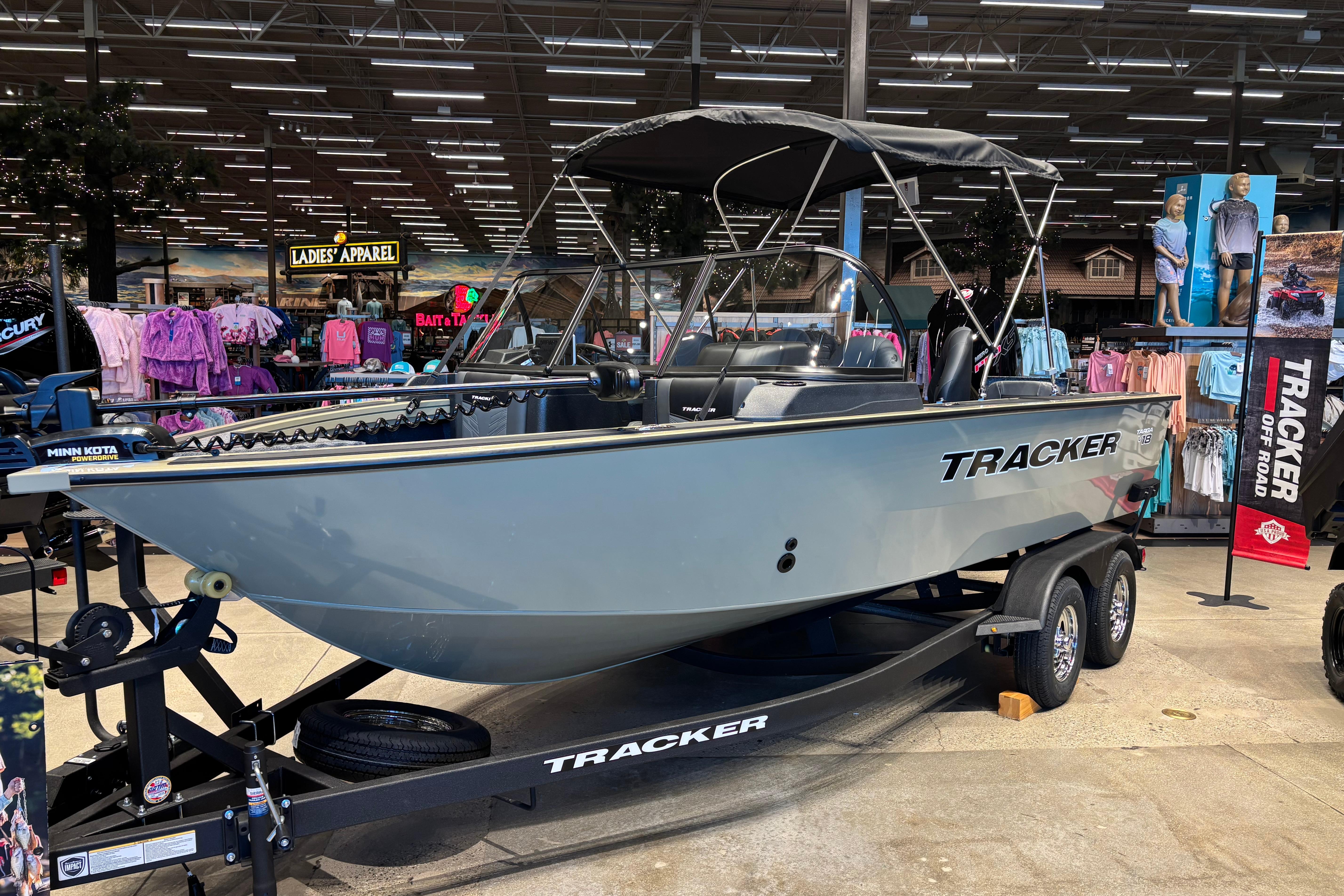 2026 Tracker Targa V-18 Combo boat displayed indoors on a trailer.