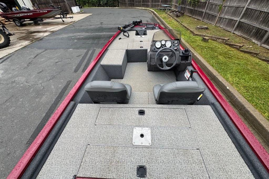 2022 Tracker Pro 170 boat interior with steering console and seating.