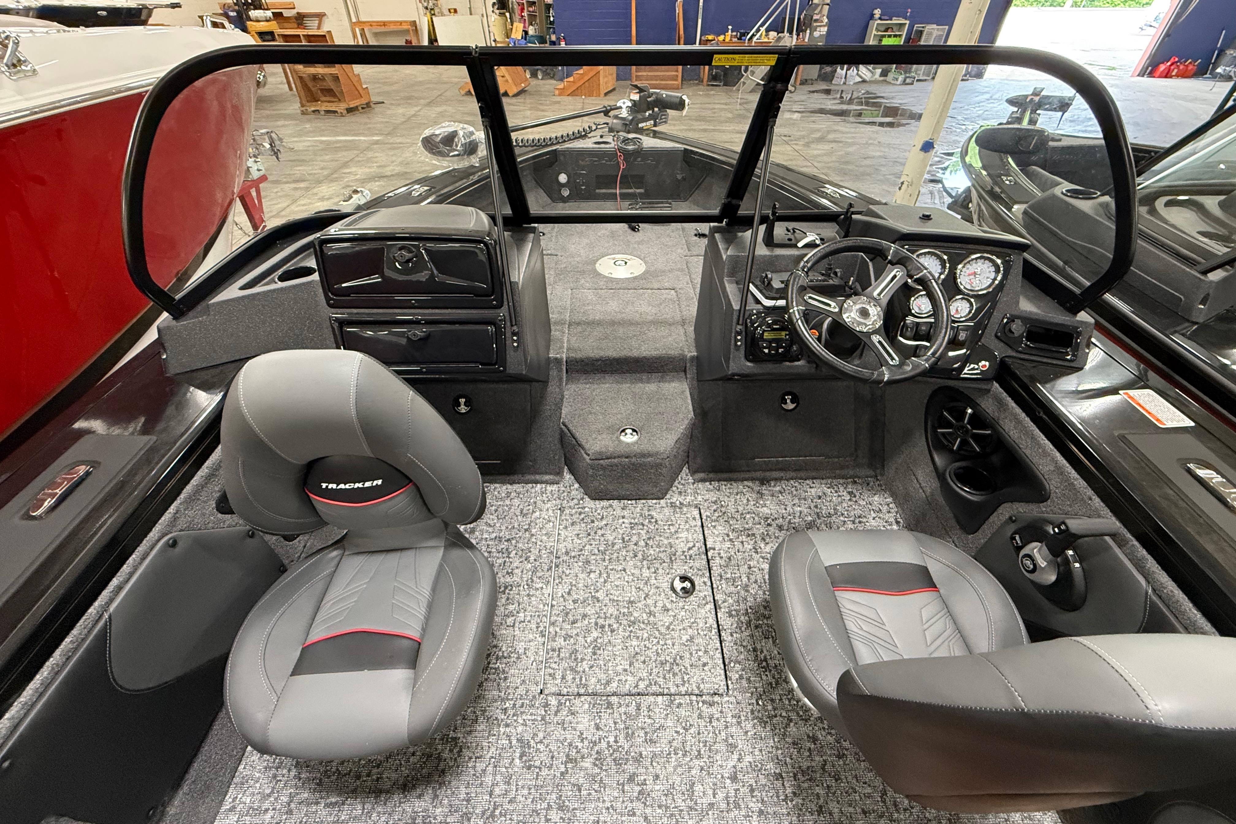 Interior of 2026 Tracker Targa V-19 WT boat with dual seats and modern dashboard.
