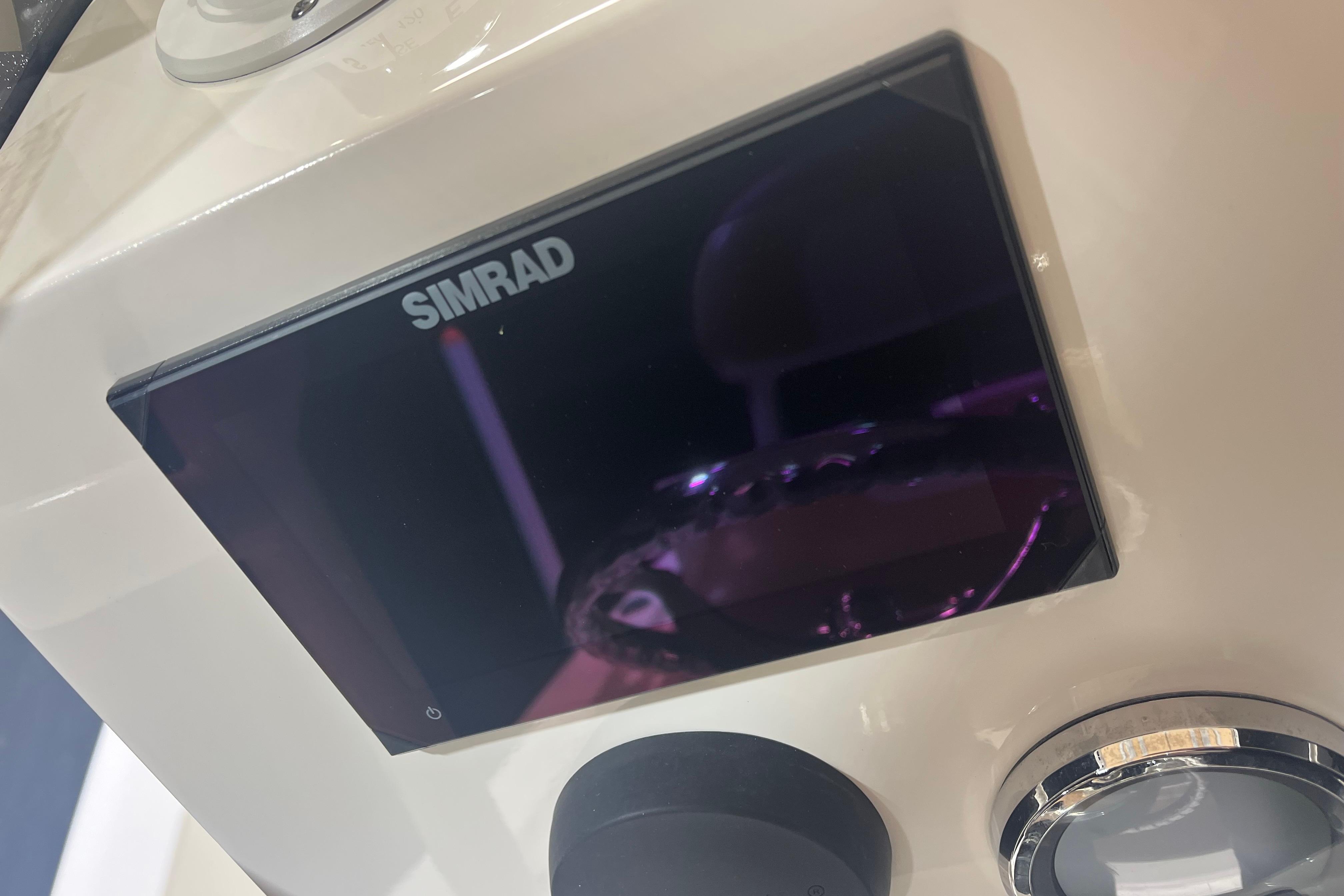 Simrad display on 2023 NauticStar 227 XTS boat dashboard.