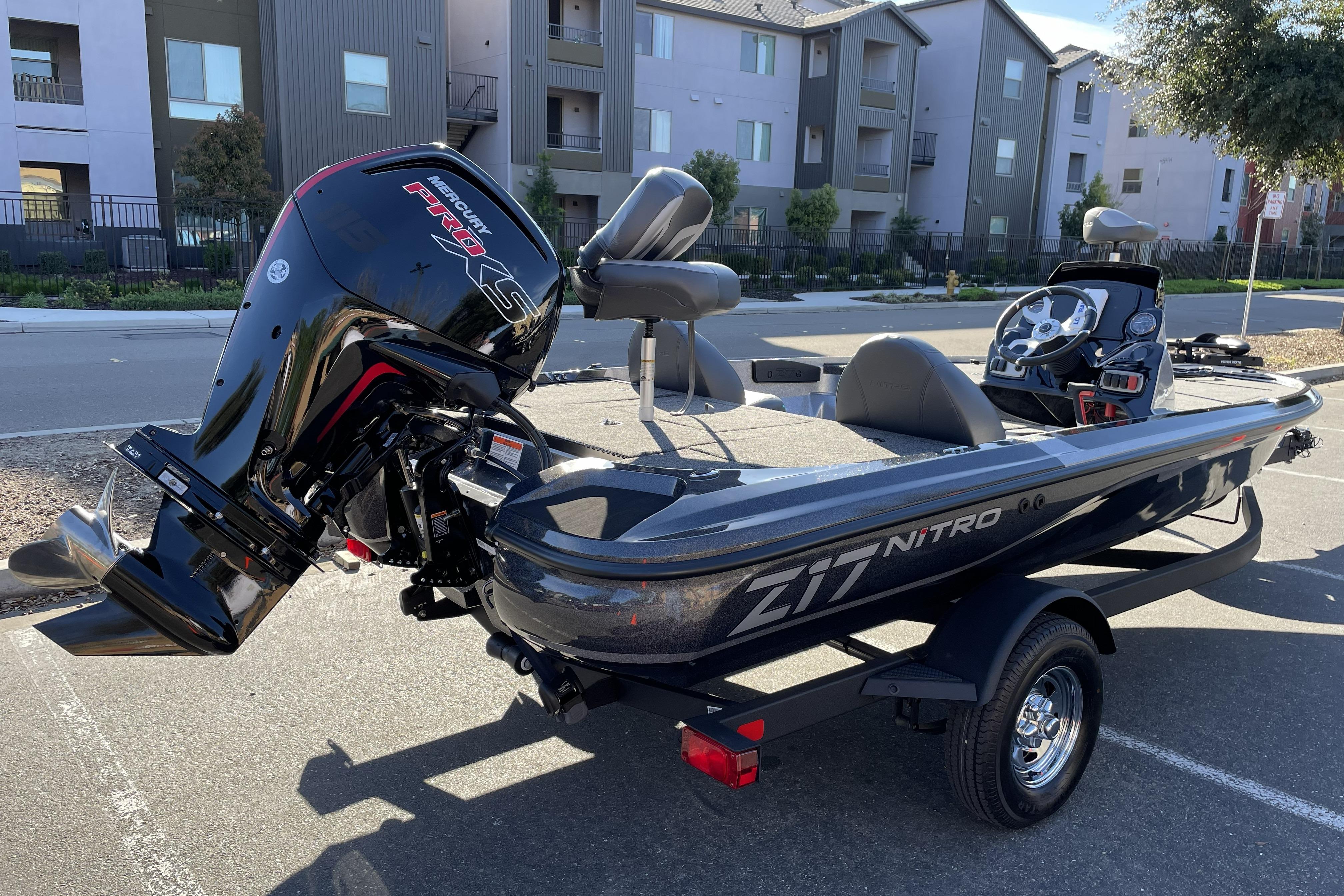 2026 Nitro Z17 boat with Mercury Pro XS engine, parked in urban setting.