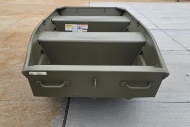 2026 Tracker Grizzly 12 Jon boat on concrete surface, showcasing sturdy design.