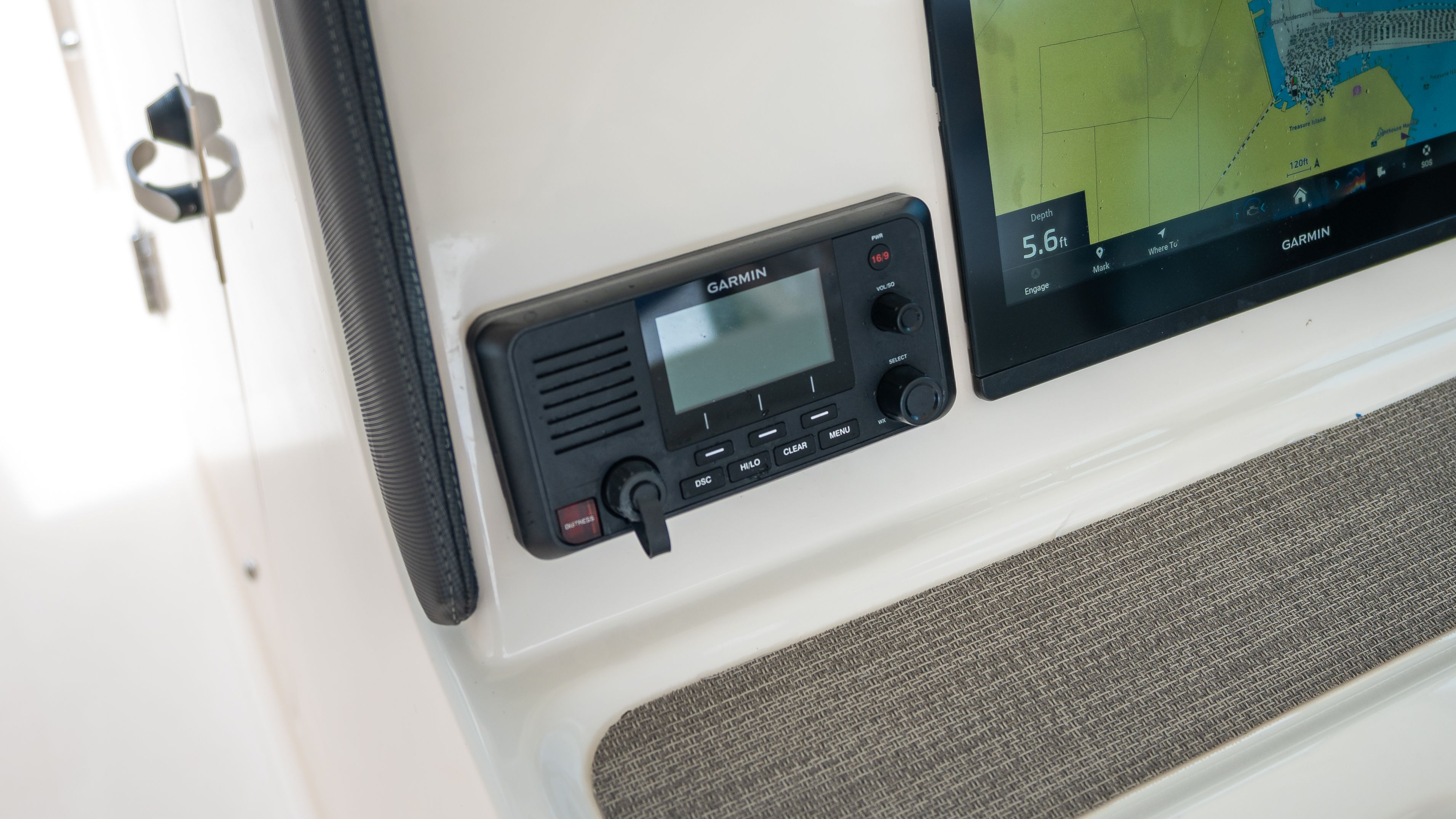 Close-up of a Garmin control panel and screen on a Grady-White 375 Freedom boat.