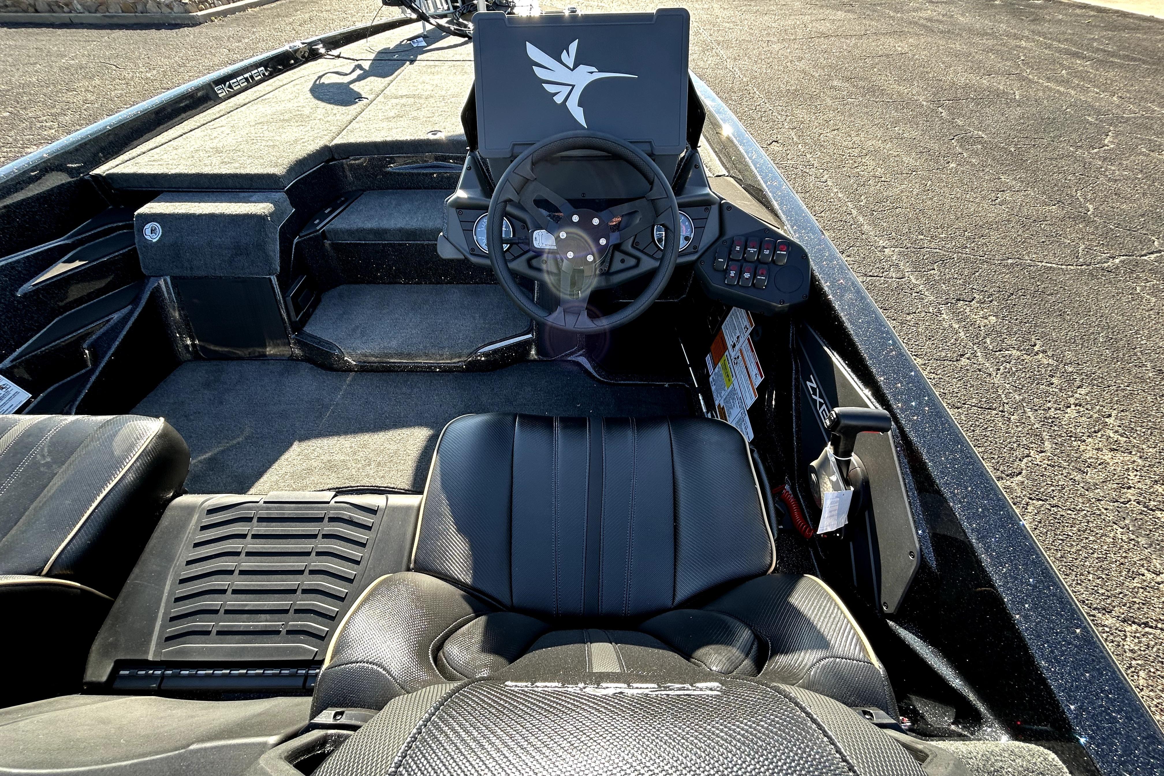 2026 Skeeter ZXE21 boat interior with steering wheel and control panel.