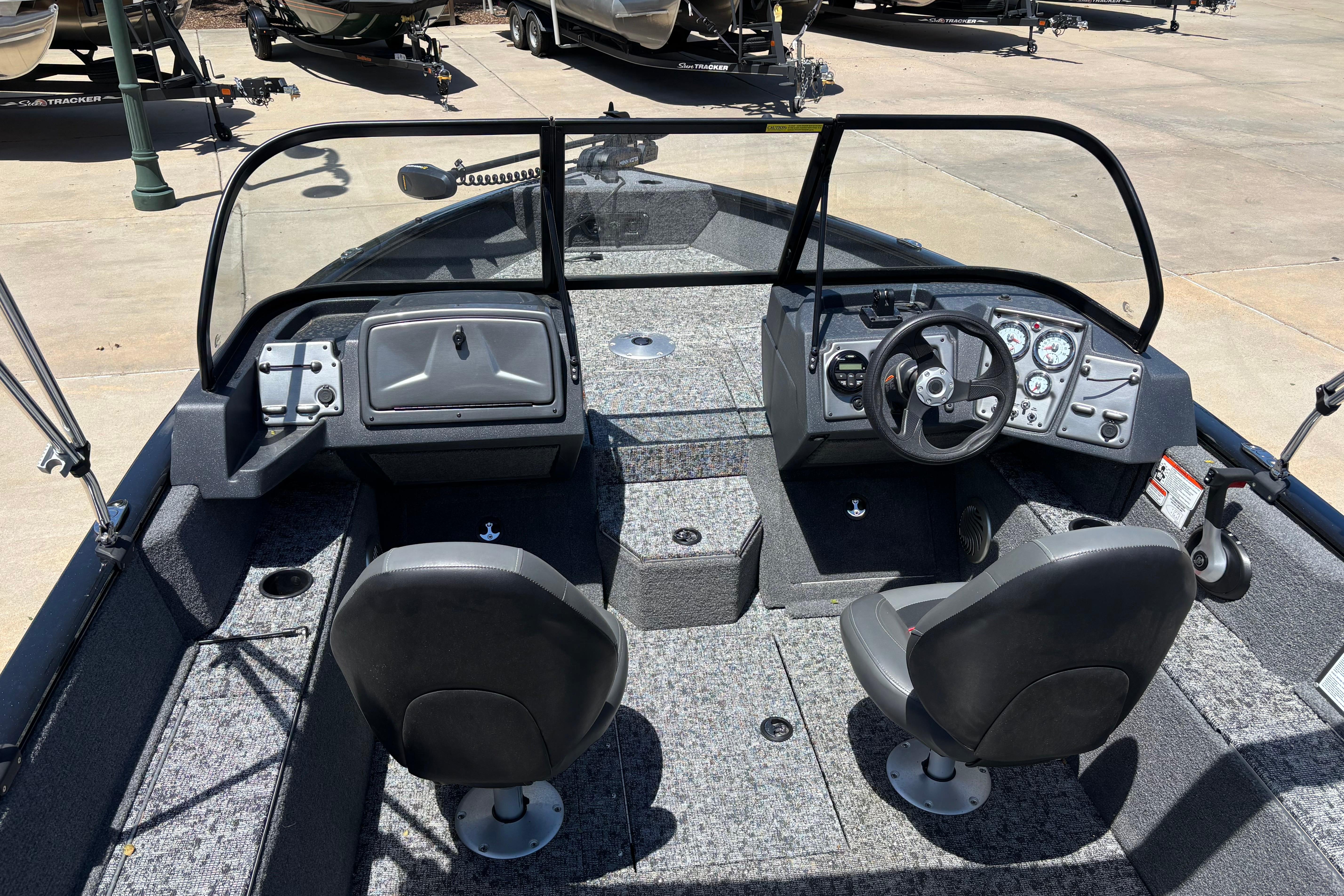2025 Tracker Pro Guide V-175 Combo boat interior with dual seats and dashboard controls.