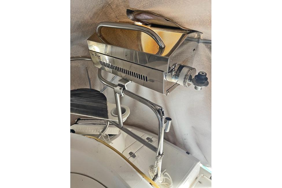 Stainless steel grill on a 1999 Hunter 380 sailboat deck.