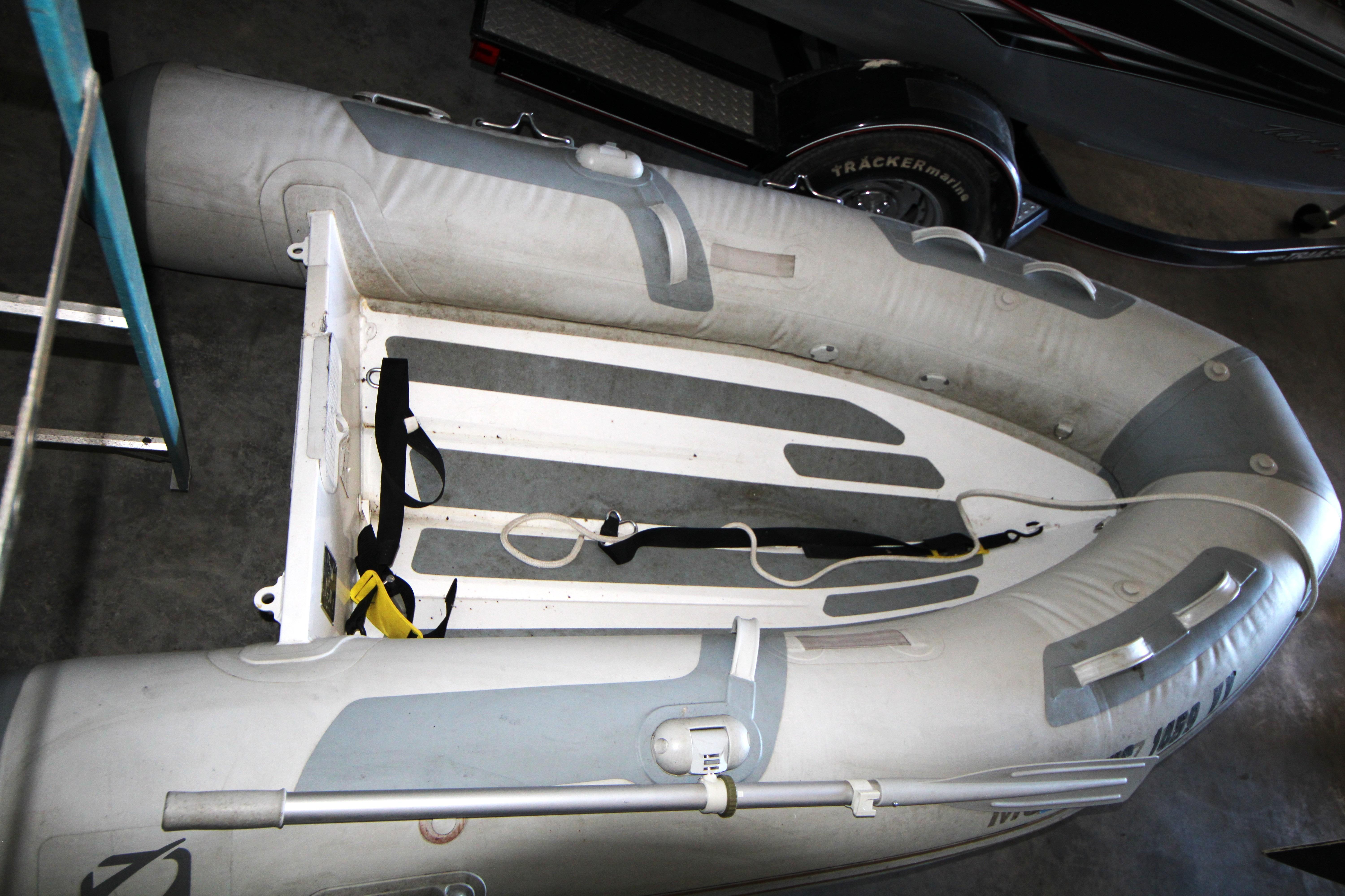 Inflatable dinghy in storage, associated with 2013 Ranger Tugs R-31 CB.