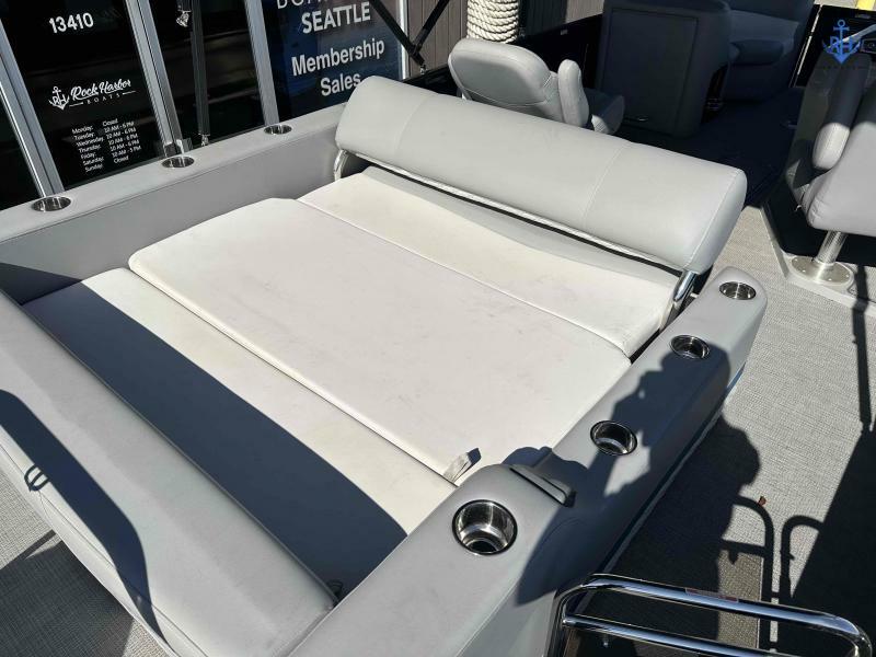 2022 Manitou Encore SL SHP 373 boat with spacious seating and cup holders.