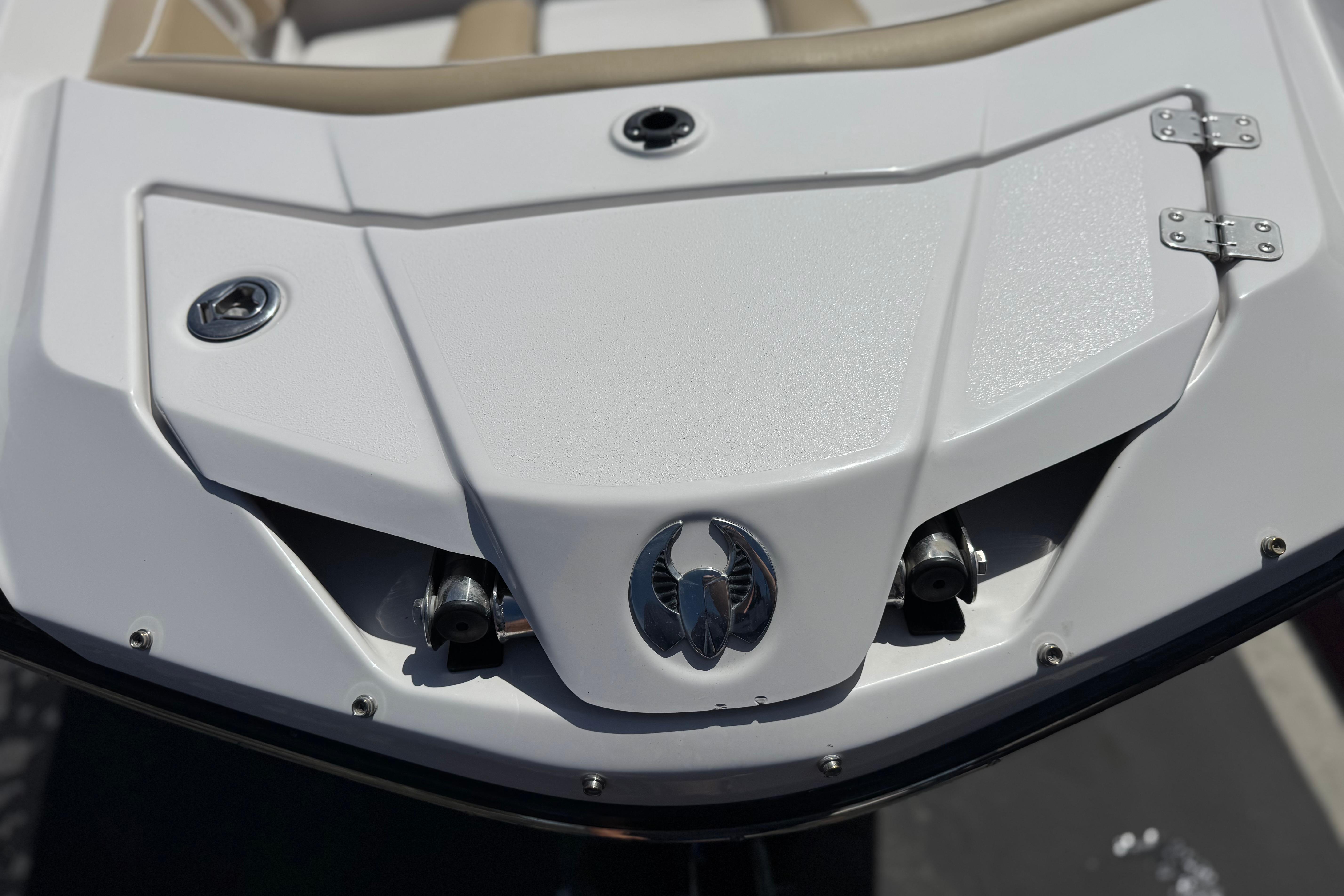 2017 Scarab 255 H.O. Platinum boat, close-up of sleek white deck design.