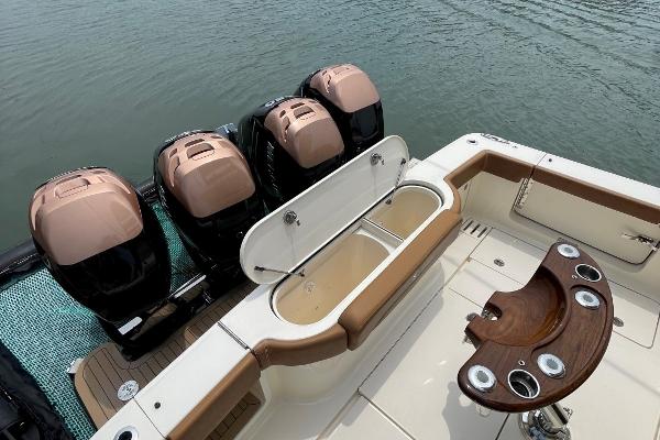 2020 Scout 420 LXF boat with four engines and fishing station.