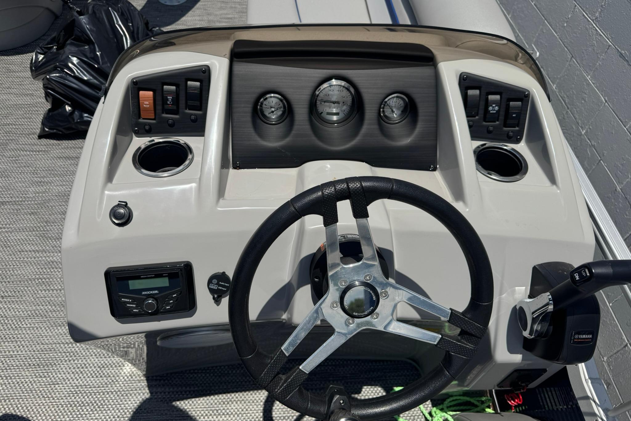 2024 Bennington SV 168 SLV 8' Narrow Beam boat dashboard with steering wheel and controls.