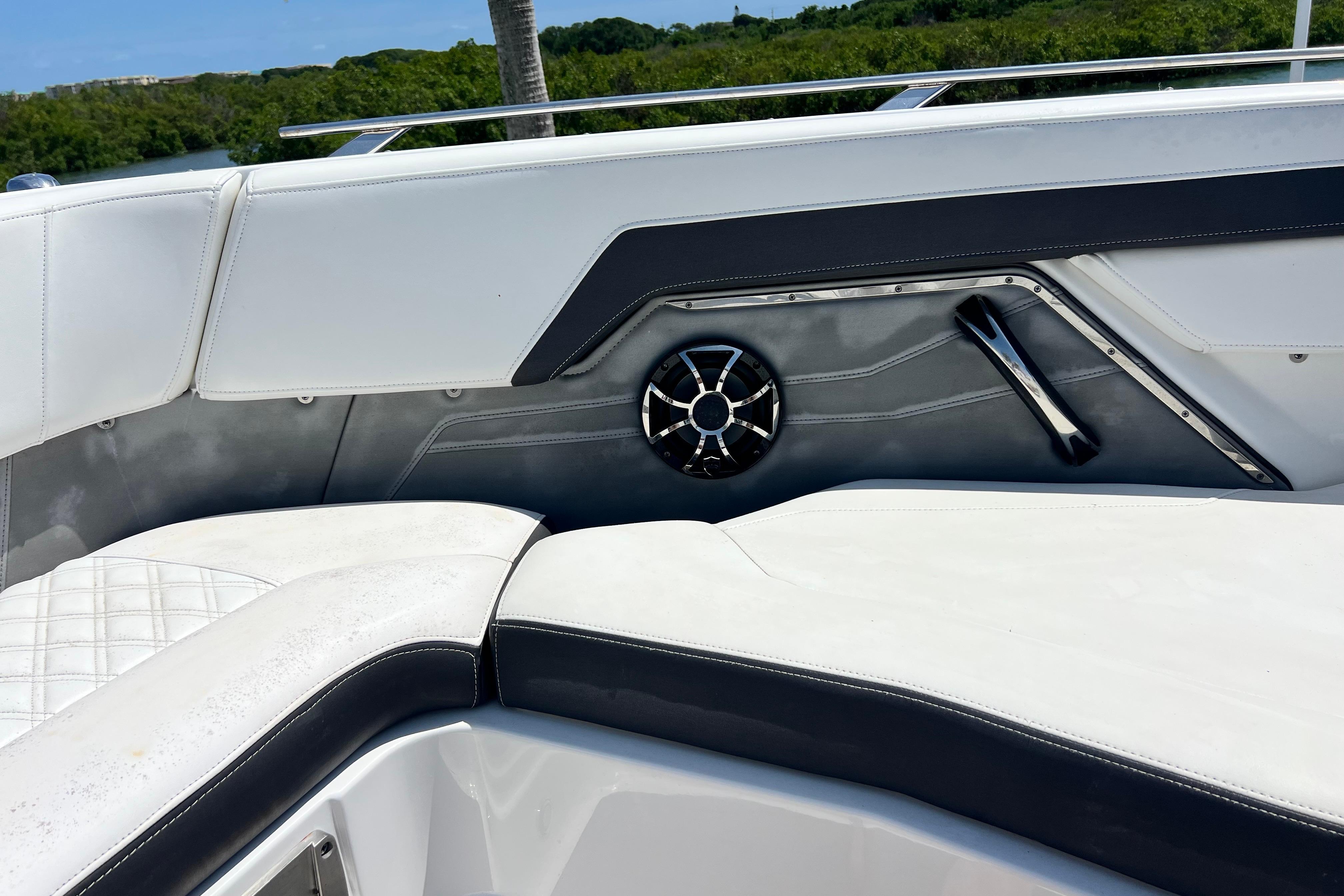 2015 Monterey 268SS Super Sport boat interior with white seating and speaker detail.