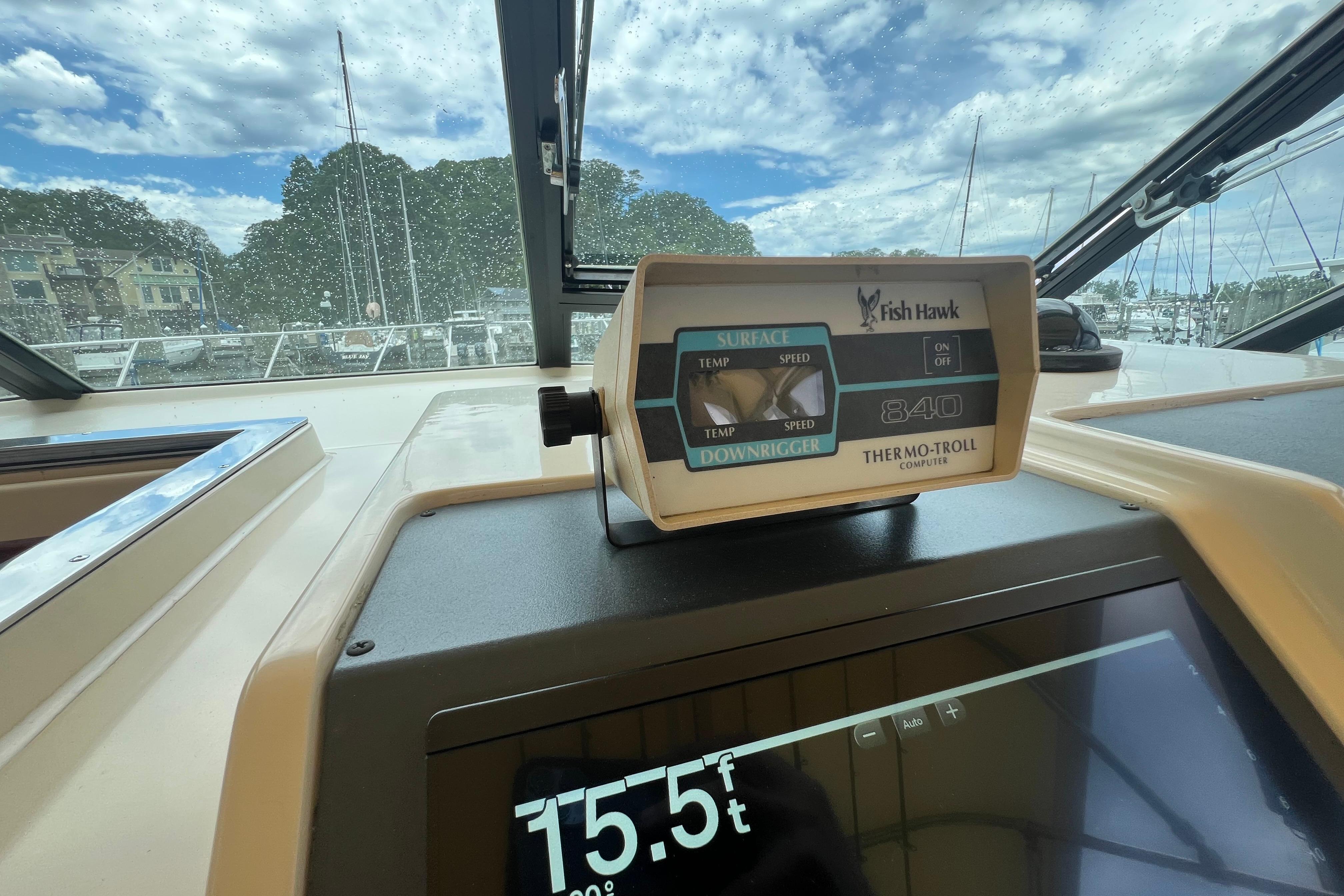 Fish Hawk Thermo-Troll computer on 1985 Tiara 36 OPEN boat dashboard.