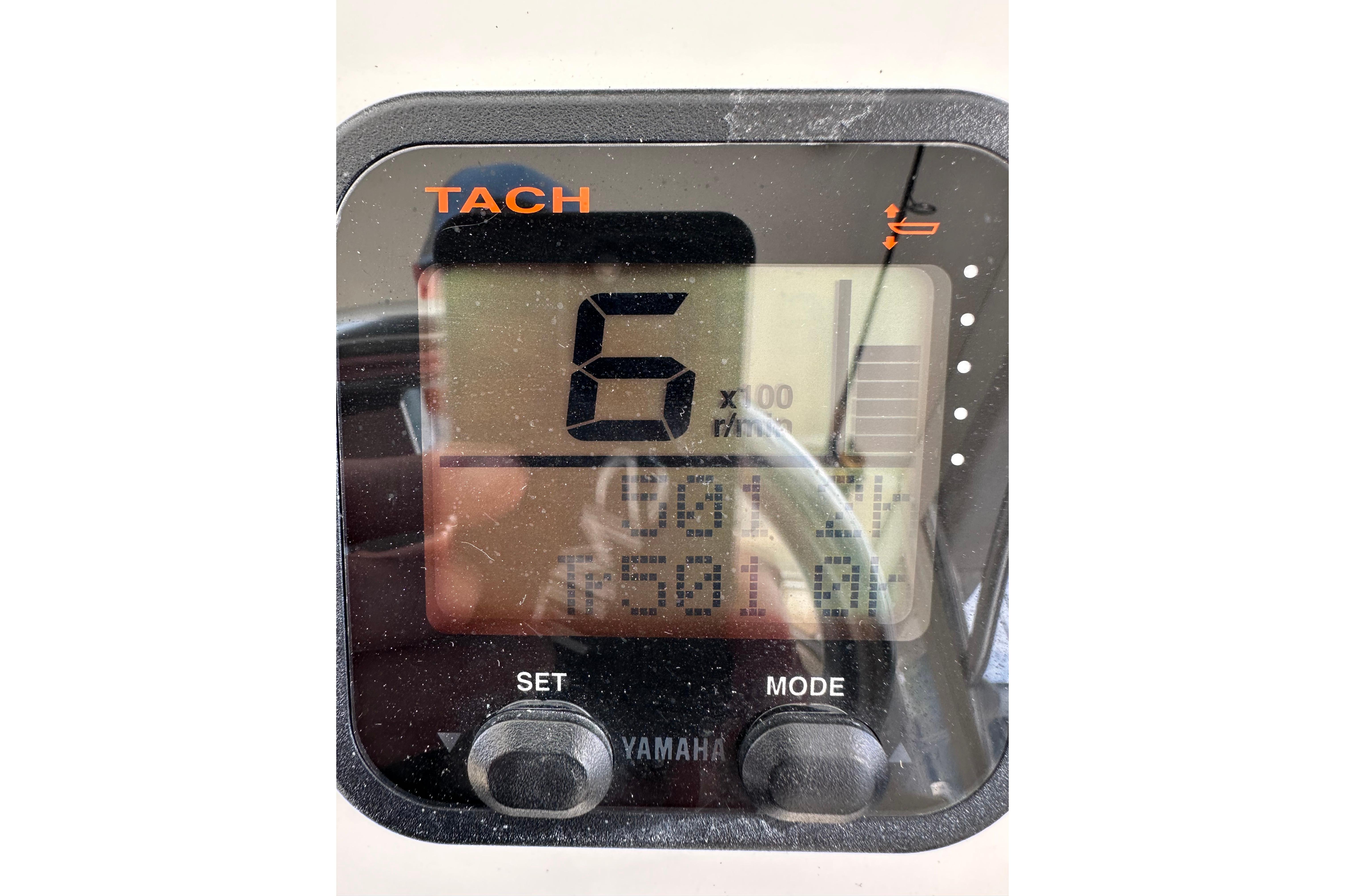 Tachometer display on 2009 Intrepid 430 Sport Yacht, showing RPM and settings.