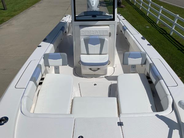 2024 Robalo 266 Cayman boat interior with white seating and console.